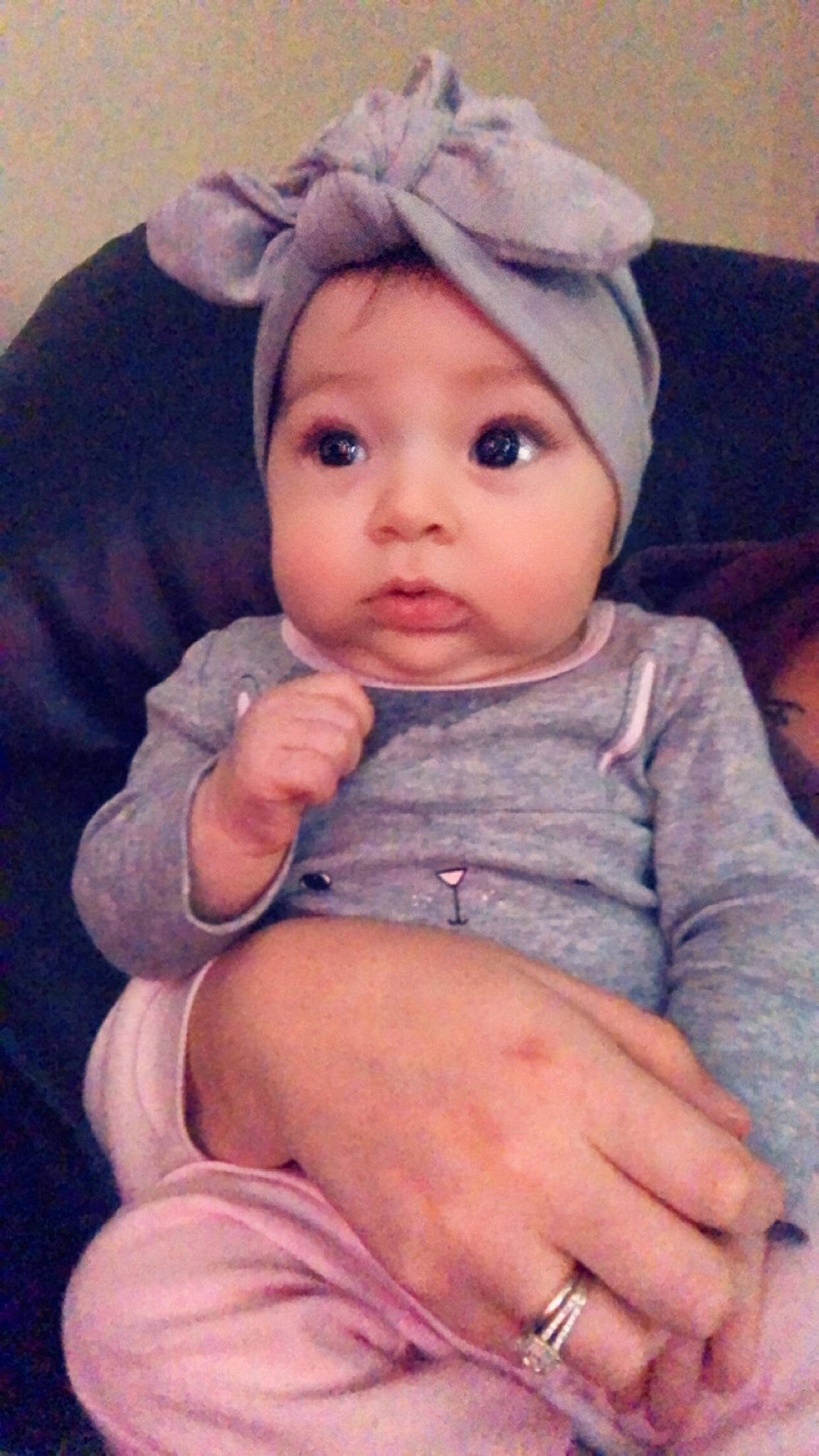 Mia is registered to the contest to win money with this photo: cheek, child, ear, finger, hair_accessory, head, headgear, infant, iris, person, product, toddler