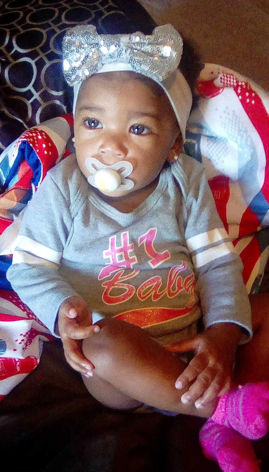 De'Asia is registered to the contest to win money with this photo: child, girl, headgear, infant, person, play, product, toddler