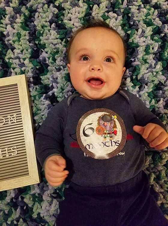 Odin is registered to the contest to win money with this photo: baby, baby_laughing, baby_toddler_clothing, cheek, clothing, cool, finger, gesture, hand, happy, nose, organ, people_in_nature, person, plant, skin, sleeve, smile, t_shirt, textile