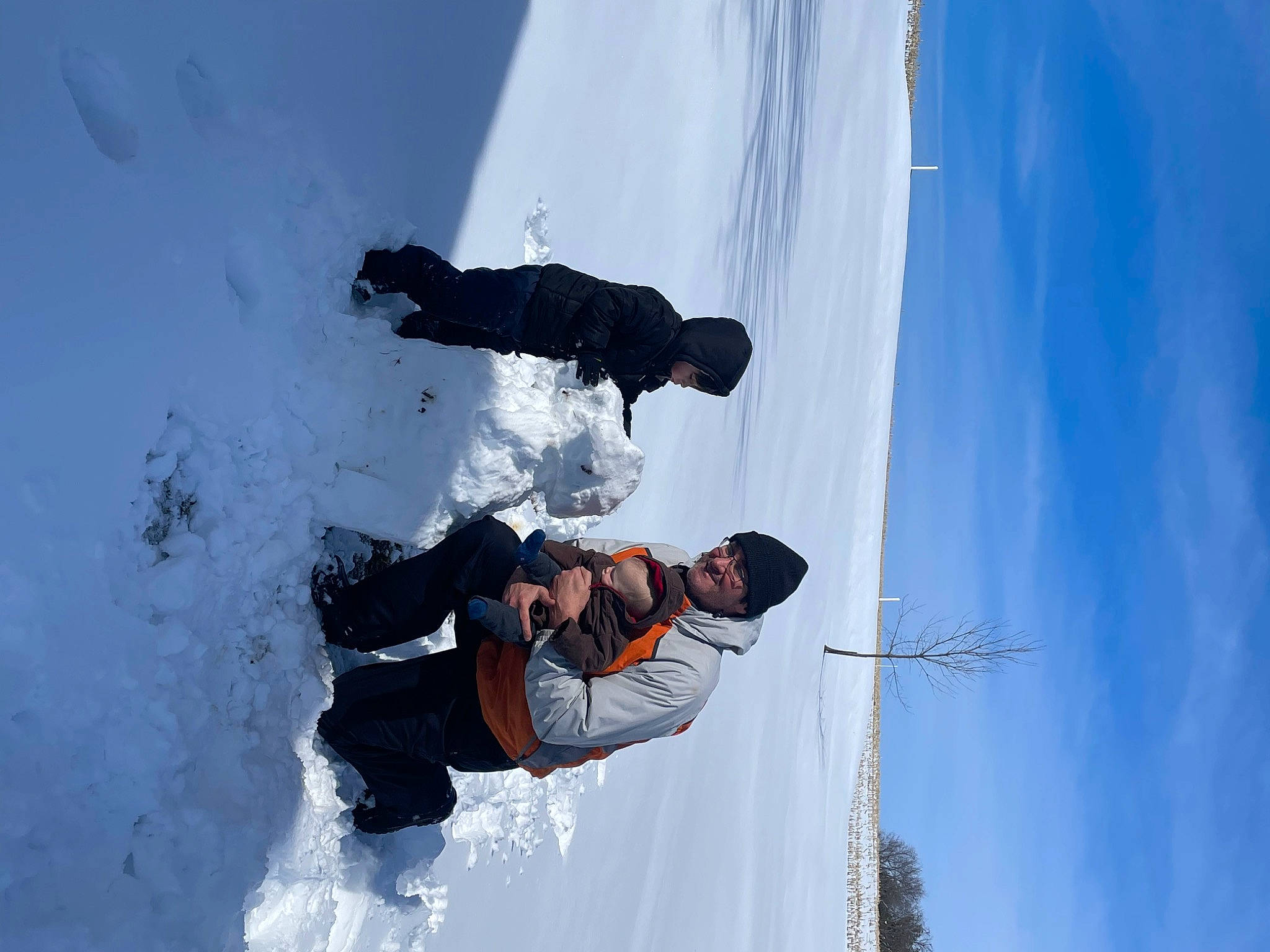 Rowen is registered to the contest to win money with this photo: adventure, electric_blue, extreme_sport, freezing, fun, geological_phenomenon, glacial_landform, glove, headwear, ice_cap, individual_sports, joy, leisure, mountaineer, person, recreation, sky, slope, snow, sports