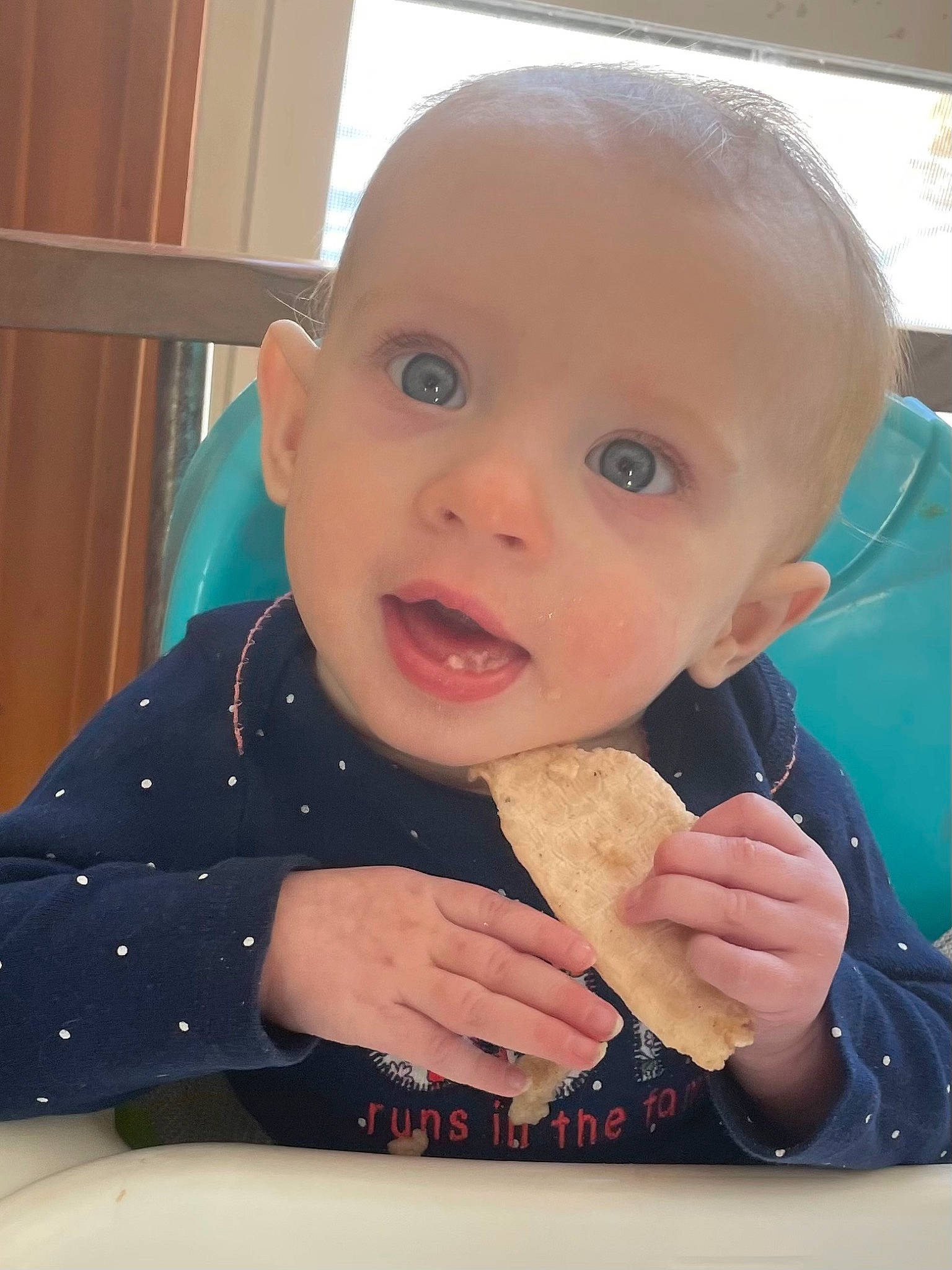Juniper joined the competition — help win amazing prizes! baby, baby_grabbing_for_something, baby_toddler_clothing, biting, cheek, child, chin, finger, food, food_craving, gesture, happy, mouth, nail, neck, nose, person, skin, smile, thumb