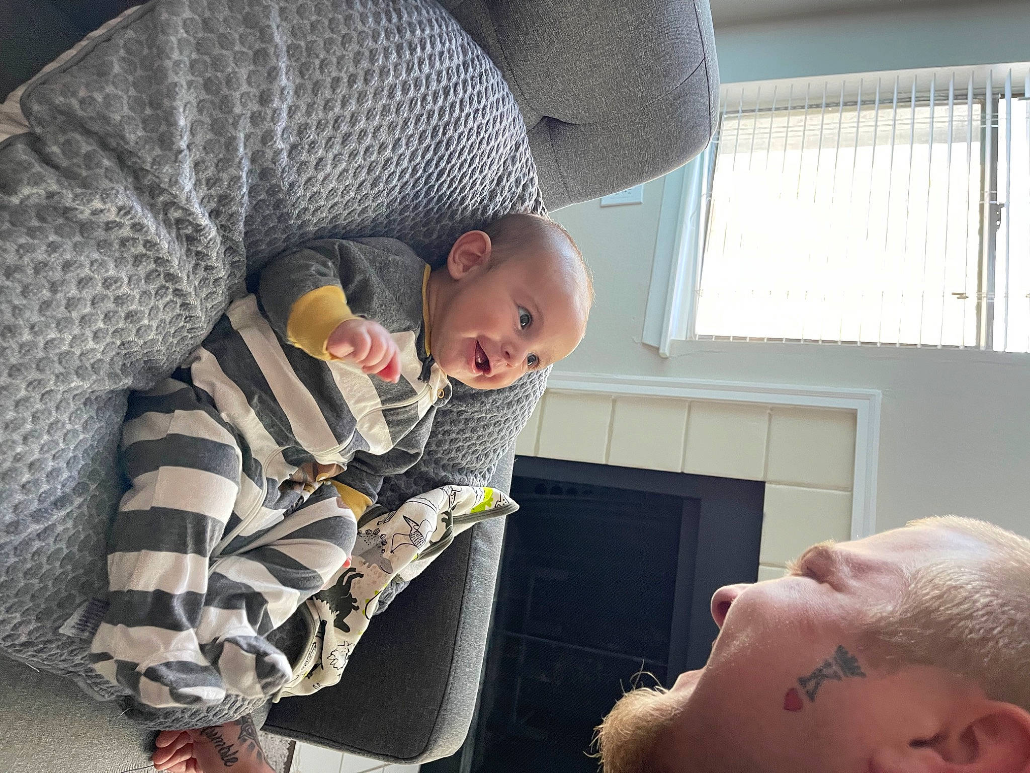 Roman is registered to the contest to win money with this photo: baby, cheek, child, comfort, ear, eyelash, finger, fun, gesture, happy, lap, mammal, mouth, nose, organ, person, room, skin, toddler, vertebrate