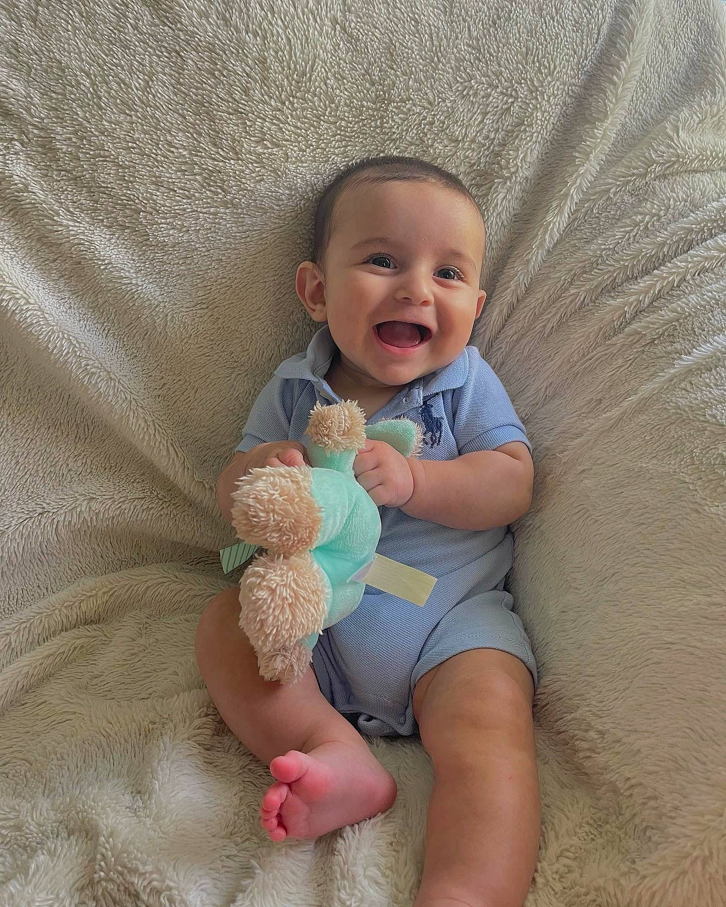 Roman is registered to the contest to win money with this photo: baby, baby_sleeping, baby_toddler_clothing, comfort, eye, face, facial_expression, finger, hand, happy, head, human_body, leg, person, skin, smile, textile, thigh, thumb, toddler