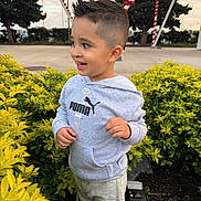 Bryton joined the competition — help win amazing prizes! boy, bushes, casual_clothing, child, concrete, daylight, decorations, greenery, hairstyle, happy, hoodie, nature, outdoor, pants, park, person, puma, side_view, smiling, yellow_leaves