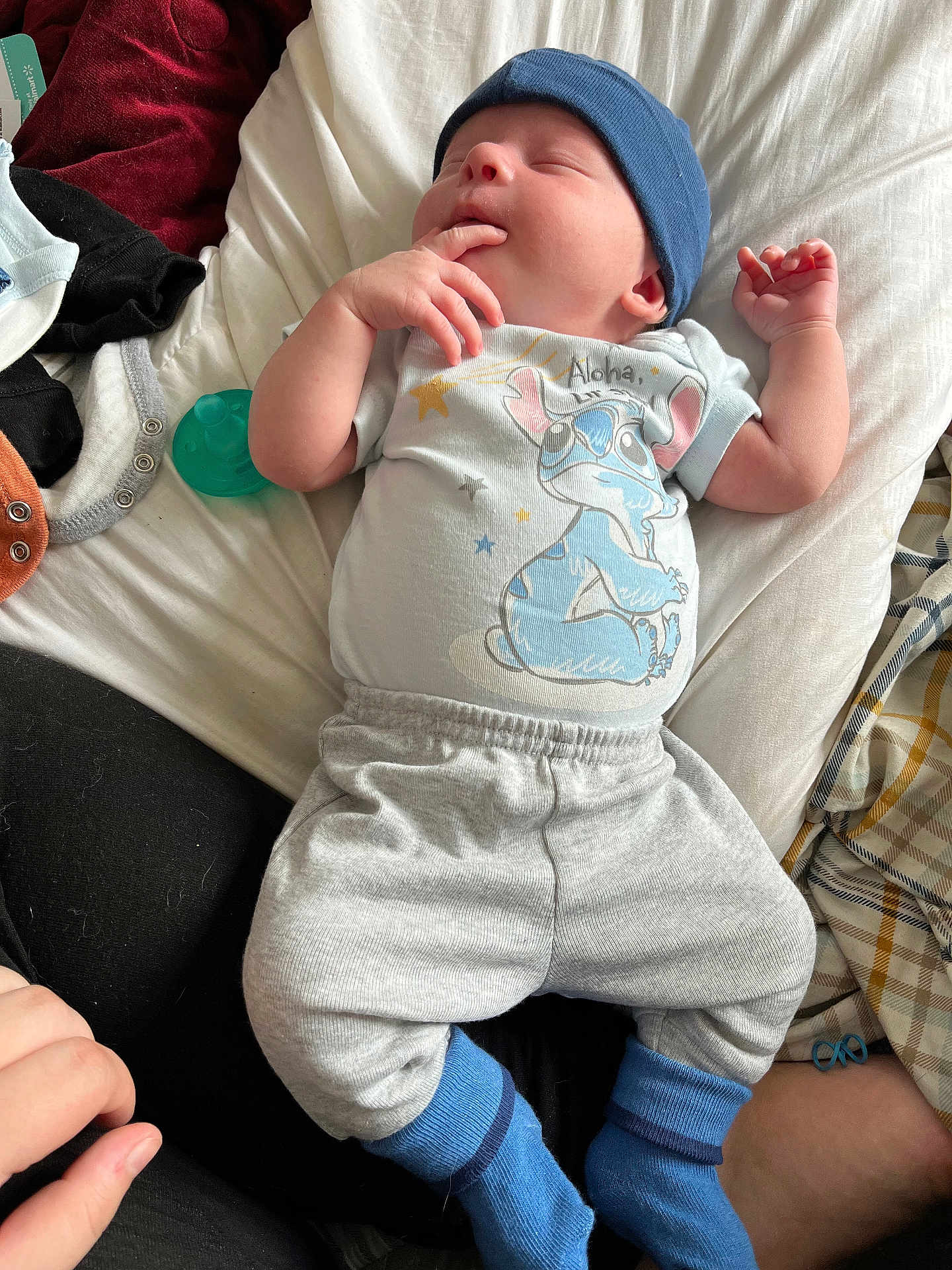 Tucker joined the competition — help win amazing prizes! baby, newborn, infant, onesie, hat, socks, pacifier, blanket, pillow, sleeping, hand, fingers, clothing, bed, lying_down, cute, cozy, portrait, soft_texture, nursery