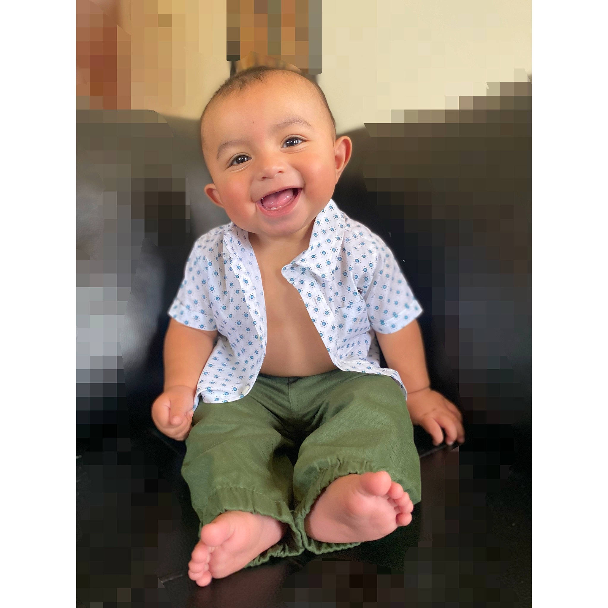 Gael joined the competition — help win amazing prizes! arm, baby, baby_toddler_clothing, collar, comfort, dress, dress_shirt, elbow, foot, happy, human_body, joy, knee, neck, pattern, person, shorts, sitting, sleeve, smile