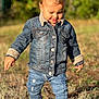 Milo participe au concours pour gagner de l'argent avec cette photo : casual, child, cute, daylight, denim_jacket, exploring, fall_clothing, fashion, grass, happy, jeans, nature, outdoor, person, portrait, shoes, sunlight, toddler, walking, young_child