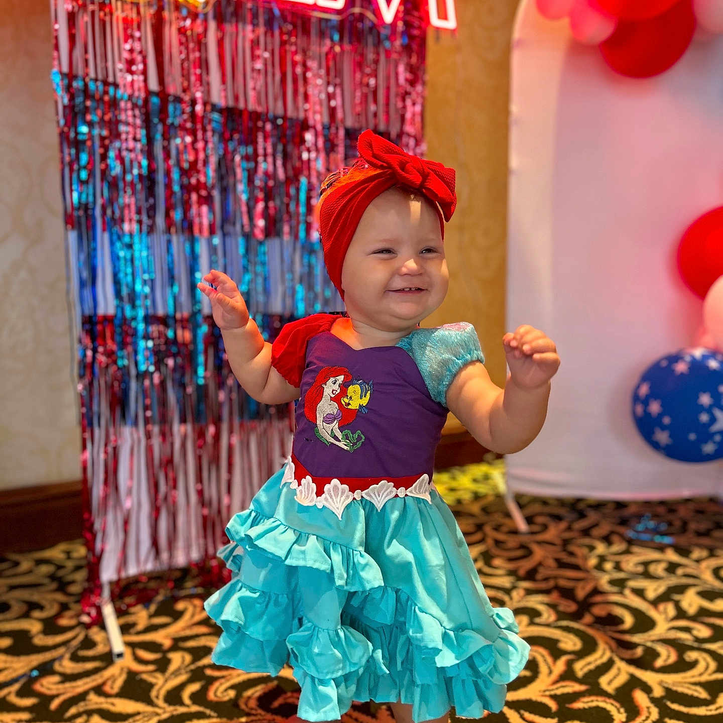 Indica is registered to the contest to win money with this photo: baby, balloon, bodypart, clothing, costume, dancing, dress, face, finger, hand, head, leisureactivities, lighting, performer, person, photography, portrait, skirt, soloperformance, urban