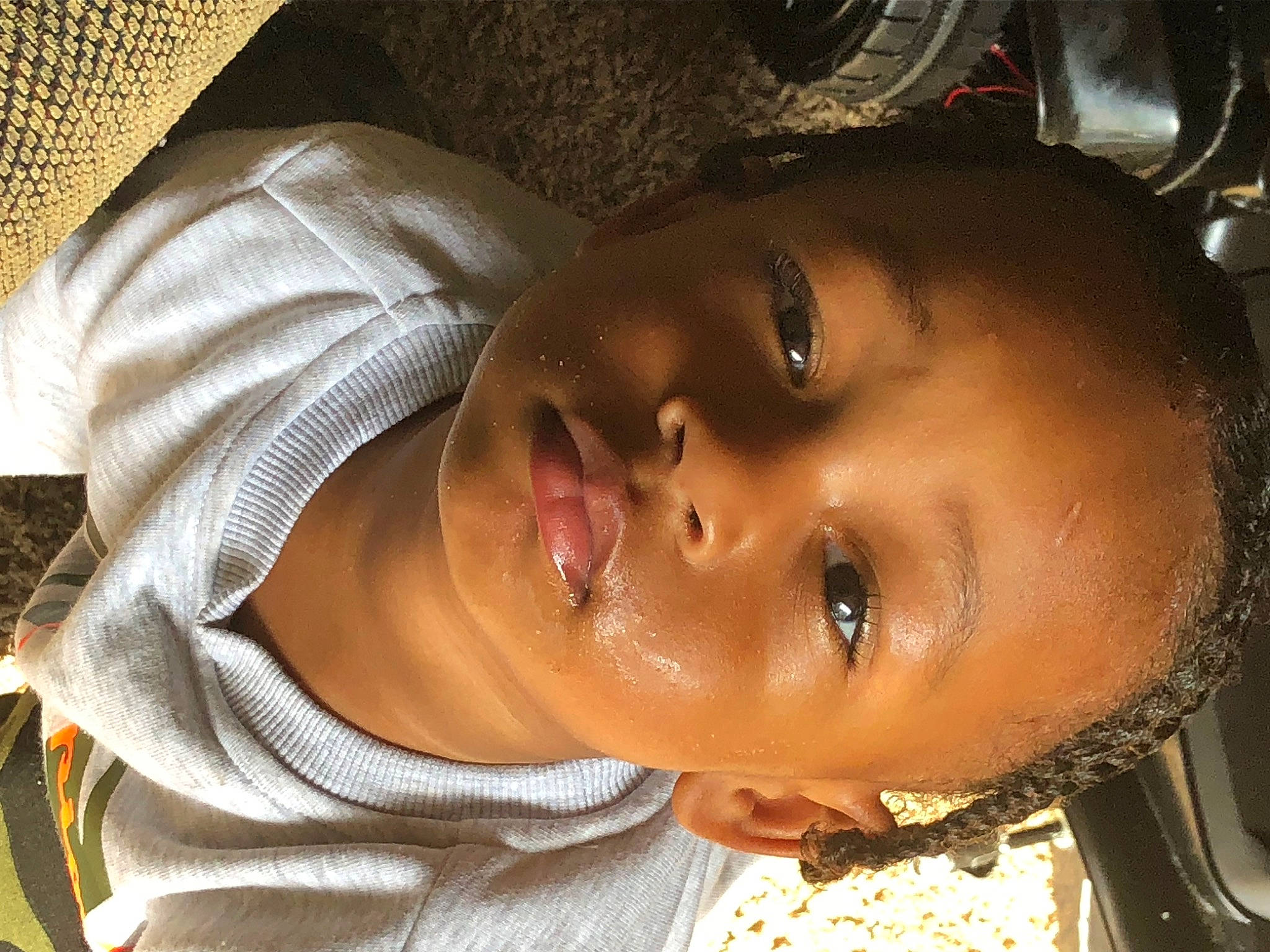 Yosiah is registered to the contest to win money with this photo: black_hair, cheek, child, chin, ear, eyebrow, eyelash, forehead, fun, happy, jaw, lip, mouth, neck, nose, person, smile, toddler, tradition, water