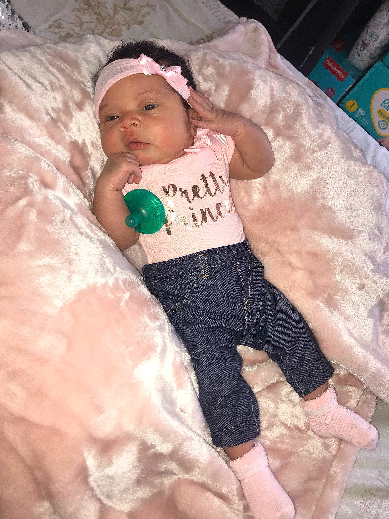 Brielle is registered to the contest to win money with this photo: abdomen, baby, baby_toddler_clothing, child, comfort, event, eye, face, fun, happy, head, headwear, human_body, human_leg, knee, leisure, person, pink, t_shirt, thigh