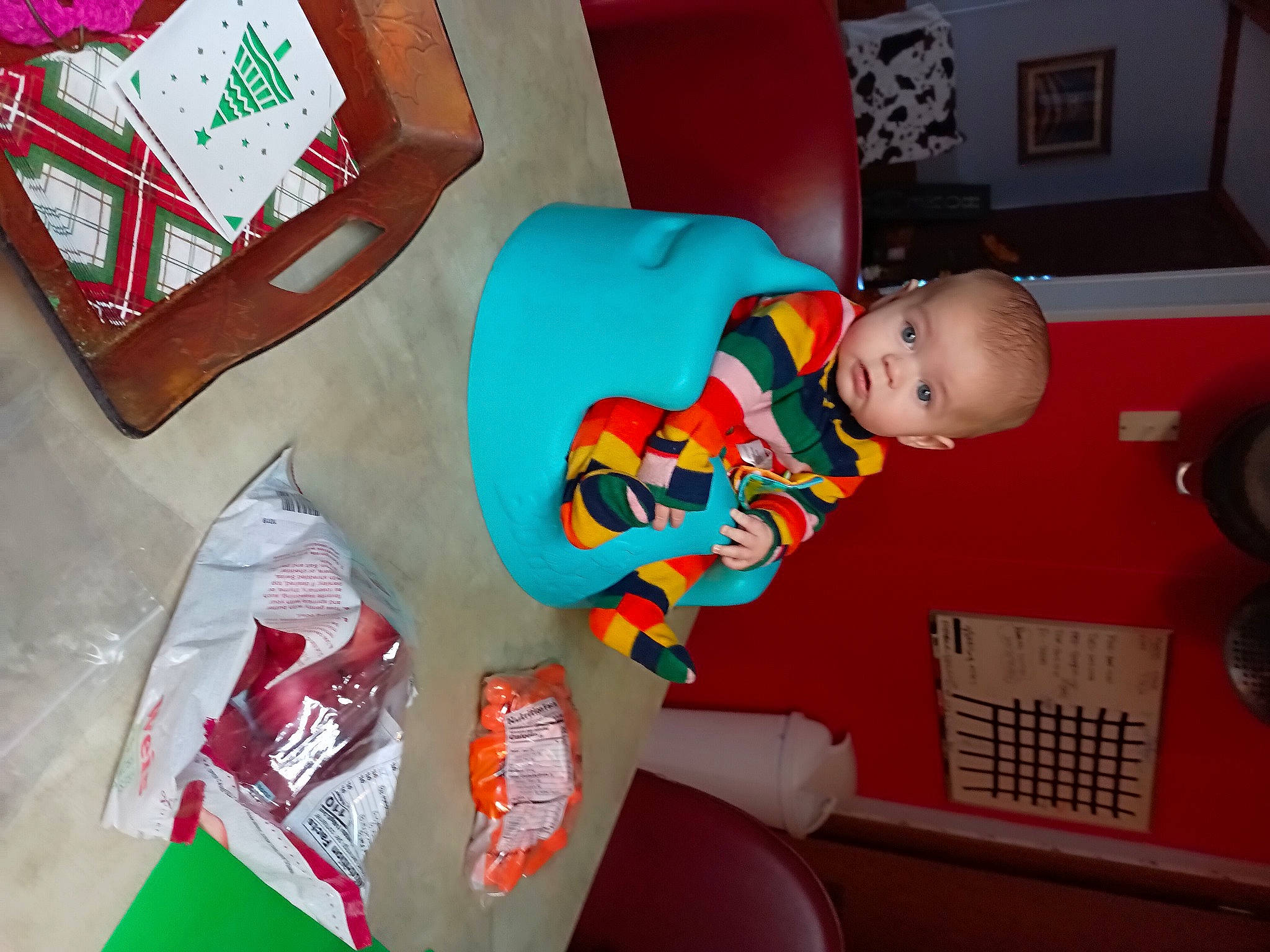 Dax is registered to the contest to win money with this photo: baby, baby_products, baby_toddler_clothing, baby_toys, carmine, chair, child, comfort, event, fun, linens, person, play, room, sitting, telephone, toddler, toy