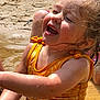 Maggie joined the competition — help win amazing prizes! arm, beach, child, closeup, fun, happy, joy, nature, outdoor, person, play, sand, skin, smiling, summer, sunlight, swimsuit, water, wet_hair, yellow
