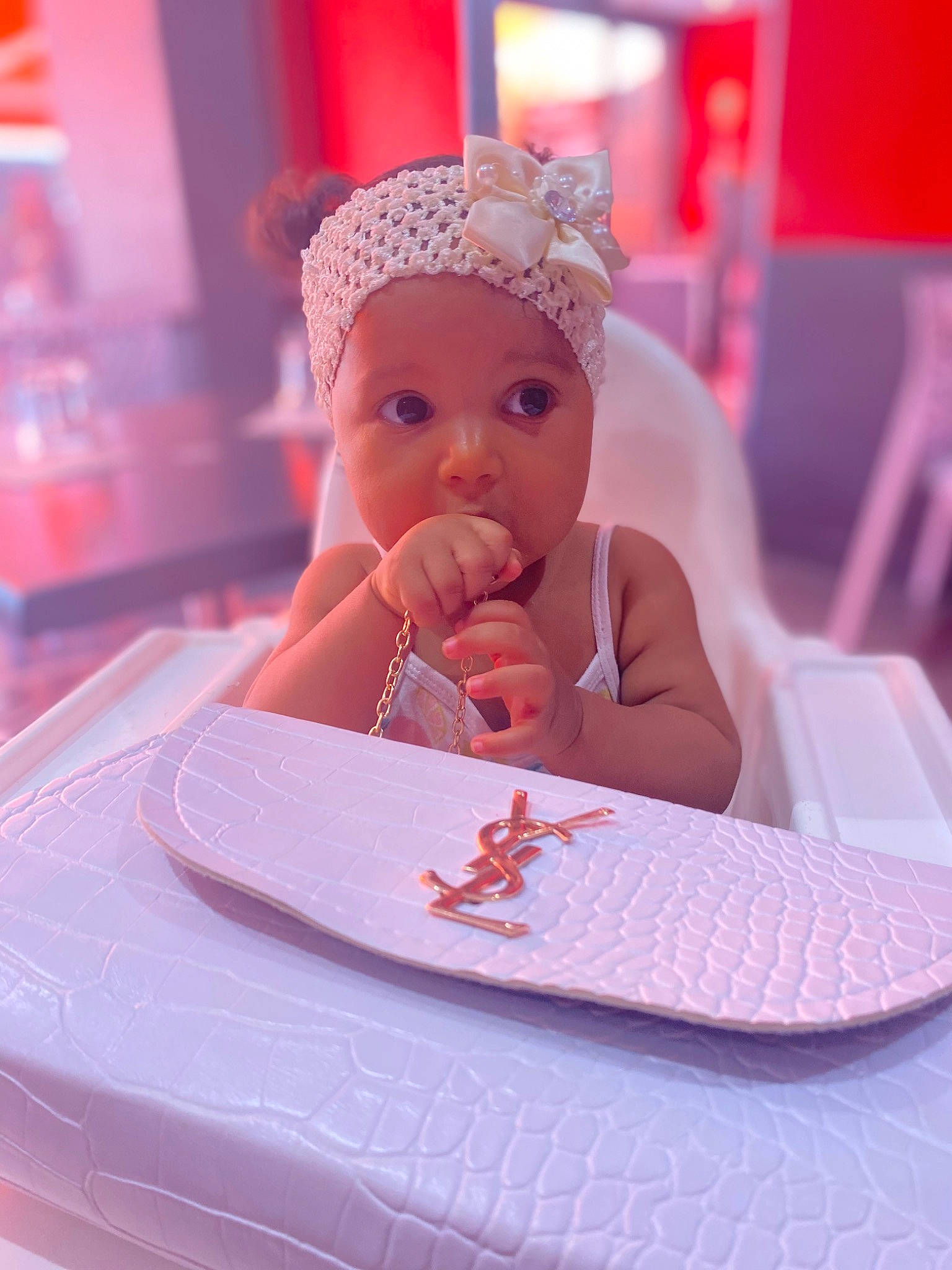 Djeyna participe au concours pour gagner de l'argent avec cette photo : baby, cap, carmine, child, drinkware, event, fashion_accessory, fun, happy, headpiece, headwear, jewellery, magenta, nail, peach, person, pink, purple, sitting, sweetness
