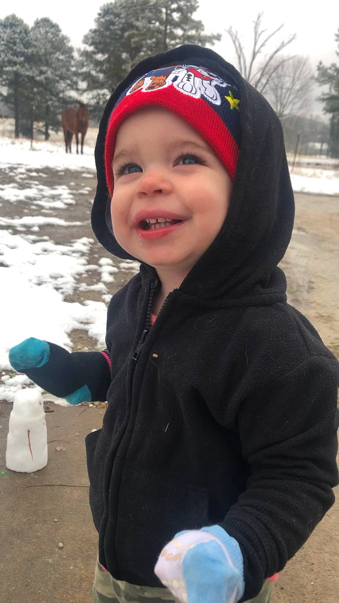 Grace is registered to the contest to win money with this photo: cap, cheek, child, freezing, fun, glove, happy, headgear, headwear, hood, jacket, joy, knit_cap, leisure, lip, person, plant, recreation, smile, snow