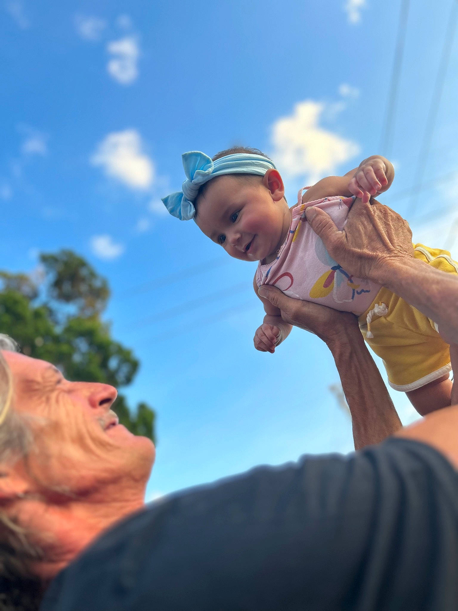 Jocelyn is registered to the contest to win money with this photo: baseball_cap, cap, cloud, cumulus, elbow, event, eyewear, flash_photography, fun, gesture, happy, hat, landscape, leisure, person, recreation, sky, sun_hat, t_shirt, toddler