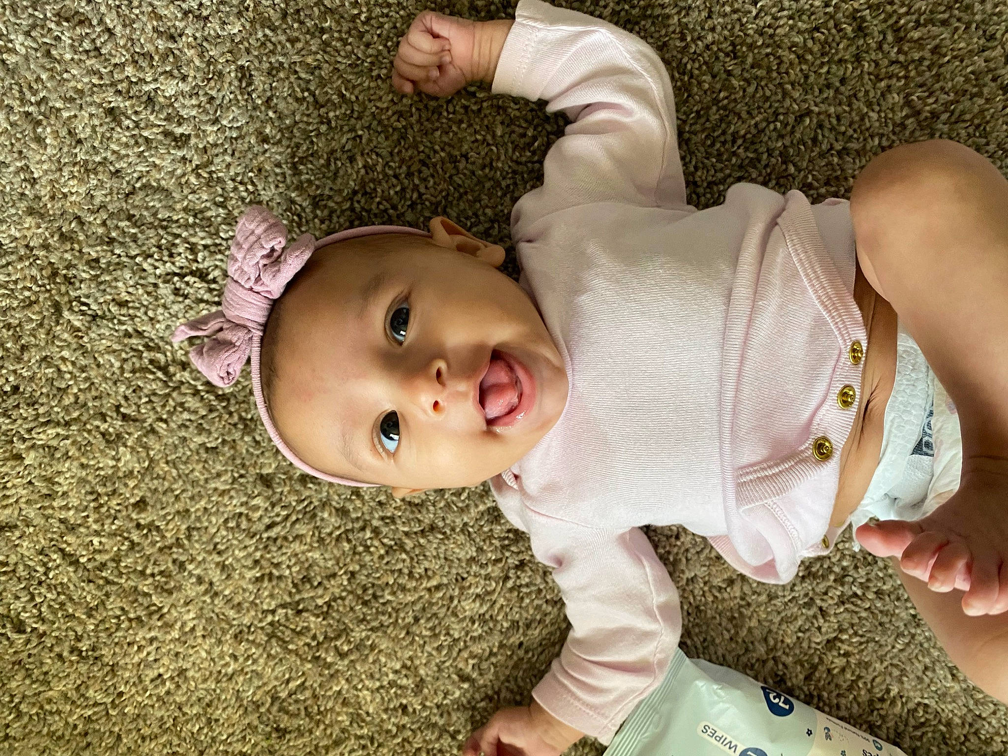 Jocelyn joined the competition — help win amazing prizes! baby, baby_toddler_clothing, cheek, child, comfort, elbow, fun, grass, happy, human_body, human_leg, mouth, nose, person, sitting, skin, sleeve, smile, thigh, toddler