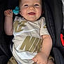 Liam Bedin participe au concours pour gagner de l'argent avec cette photo : baby, car_seat, casual, child, clothing, cute, expression, face, hand, happy, indoors, infant, nike, portrait, seatbelt, shirt, sitting, smile, toy, young