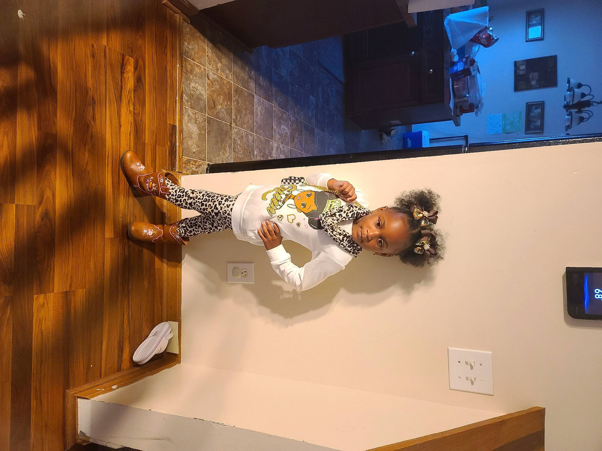 Sariah is registered to the contest to win money with this photo: art, automotive_design, ceiling, display_case, display_device, floor, flooring, fun, hardwood, house, interior_design, led_backlit_lcd_display, leisure, machine, person, room, space, television, television_set, visual_arts