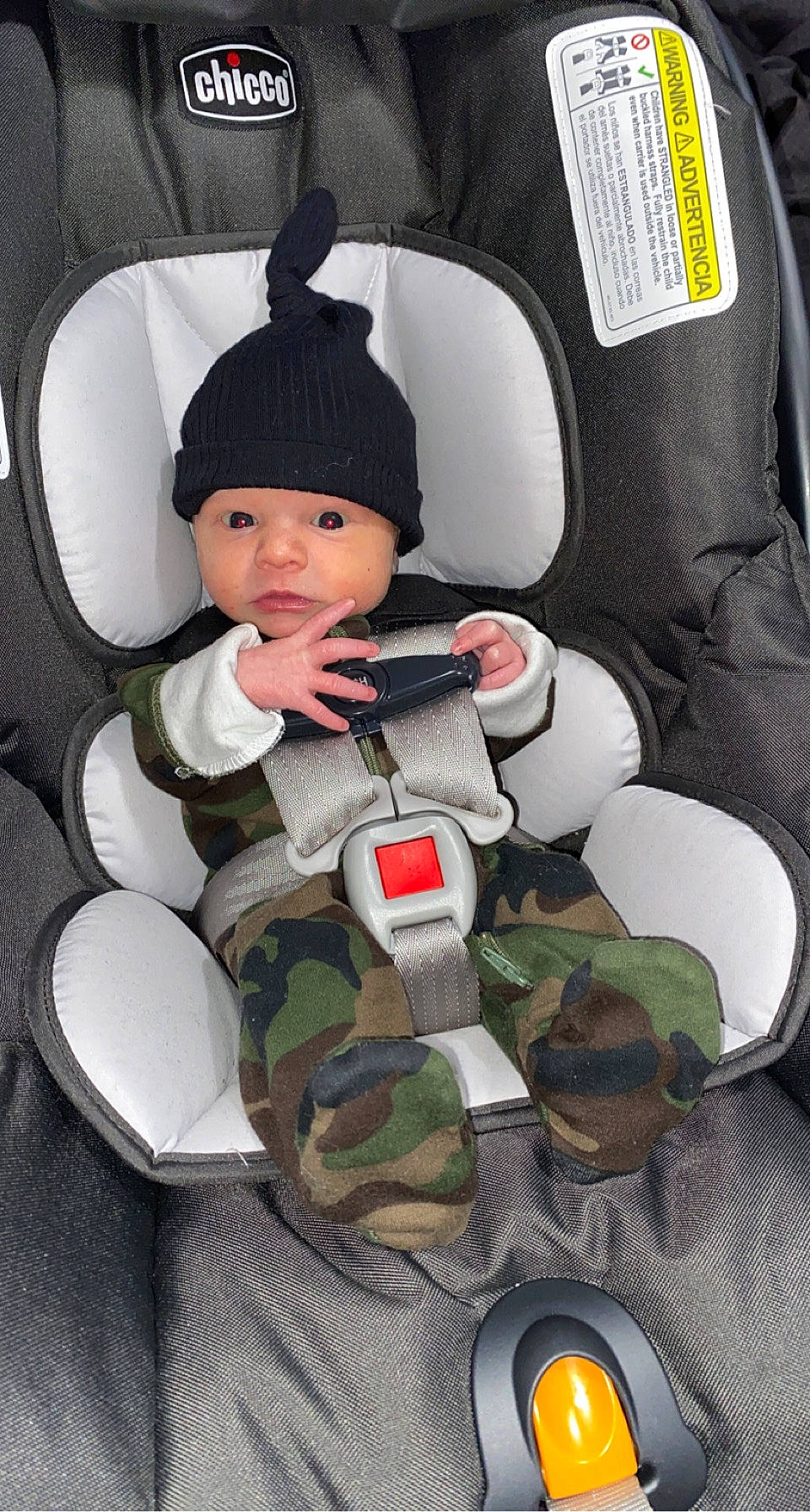 Phillip is registered to the contest to win money with this photo: auto_part, baby_products, baby_toddler_clothing, camouflage, cap, car_seat, carmine, child, costume_hat, fictional_character, headwear, helmet, military_camouflage, outerwear, pattern, person, personal_protective_equipment, sleeve, sports_gear, toddler