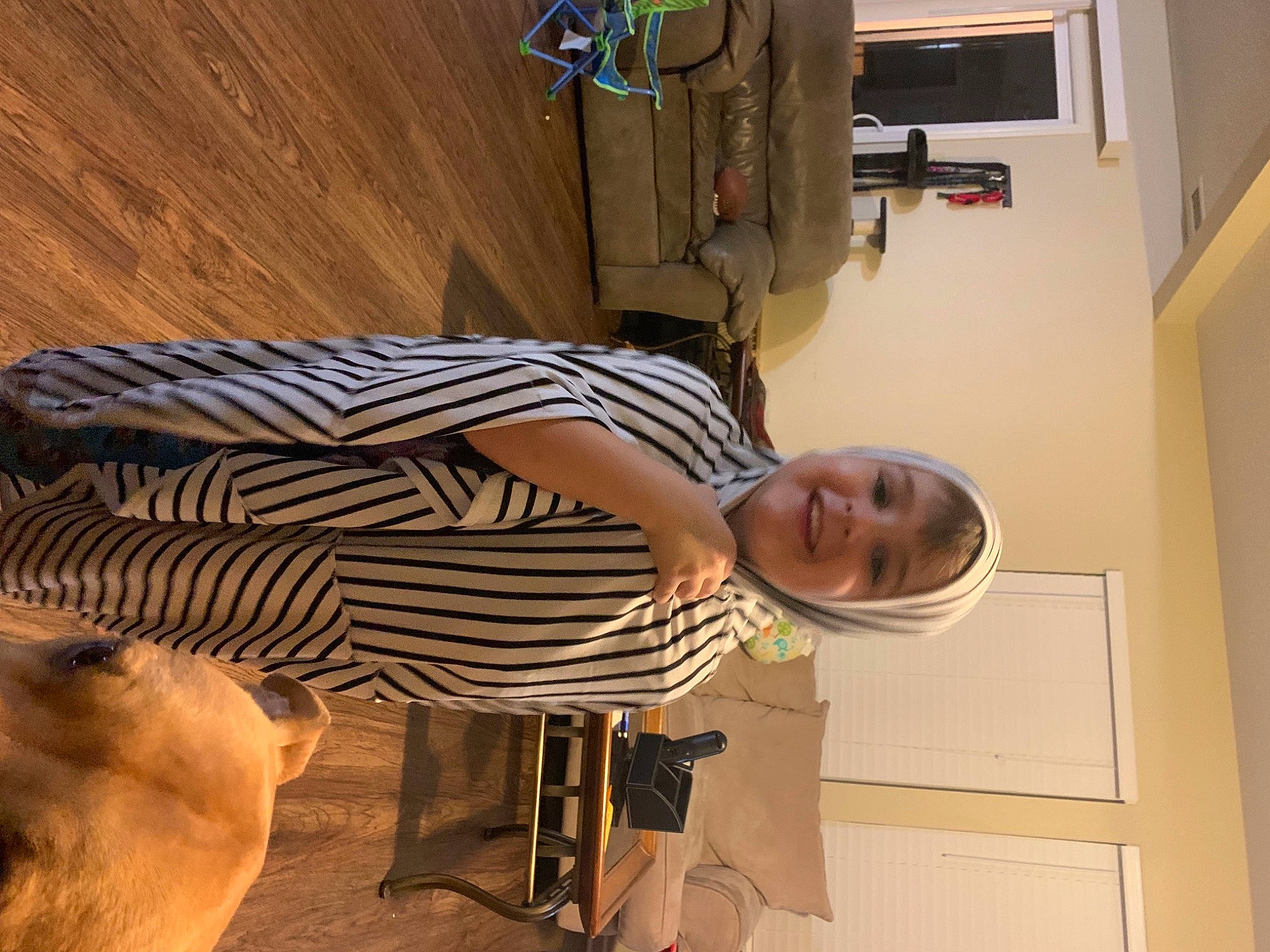 Leeland is registered to the contest to win money with this photo: cabinetry, elbow, fawn, joy, person, plywood, shoulder, wood_flooring, working_animal