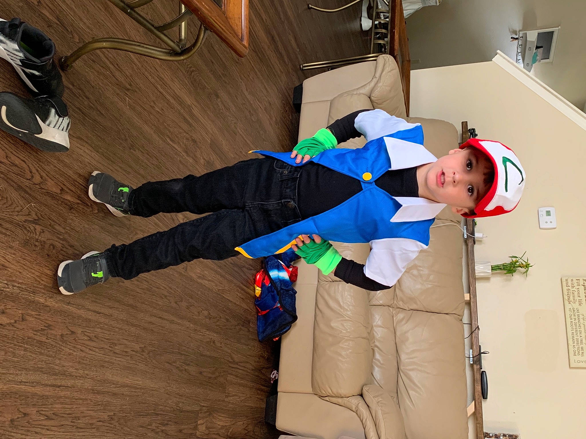 Leeland is registered to the contest to win money with this photo: athletic_shoe, costume, cross_training_shoe, fictional_character, headwear, laminate_flooring, outdoor_shoe, person, running_shoe, shoe, sock, walking_shoe, wood_flooring
