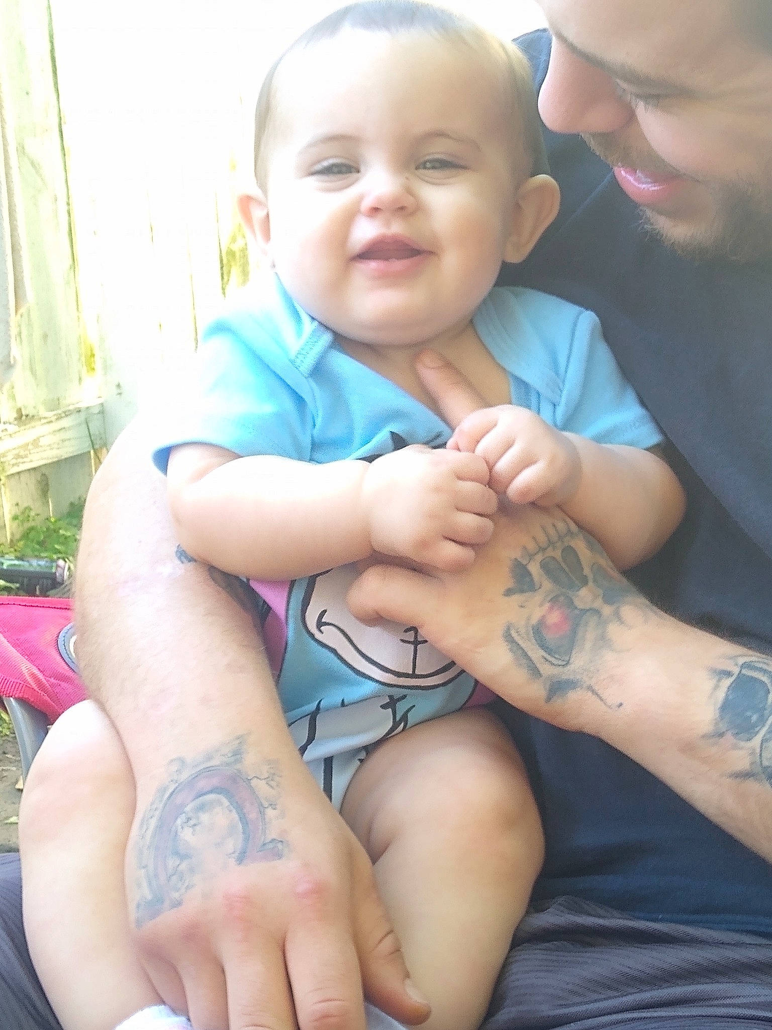 Lilyana is registered to the contest to win money with this photo: arm, baby, child, elbow, finger, hand, human_leg, joint, leg, nail, person, skin, smile, sole, tattoo, temporary_tattoo, thumb, toddler