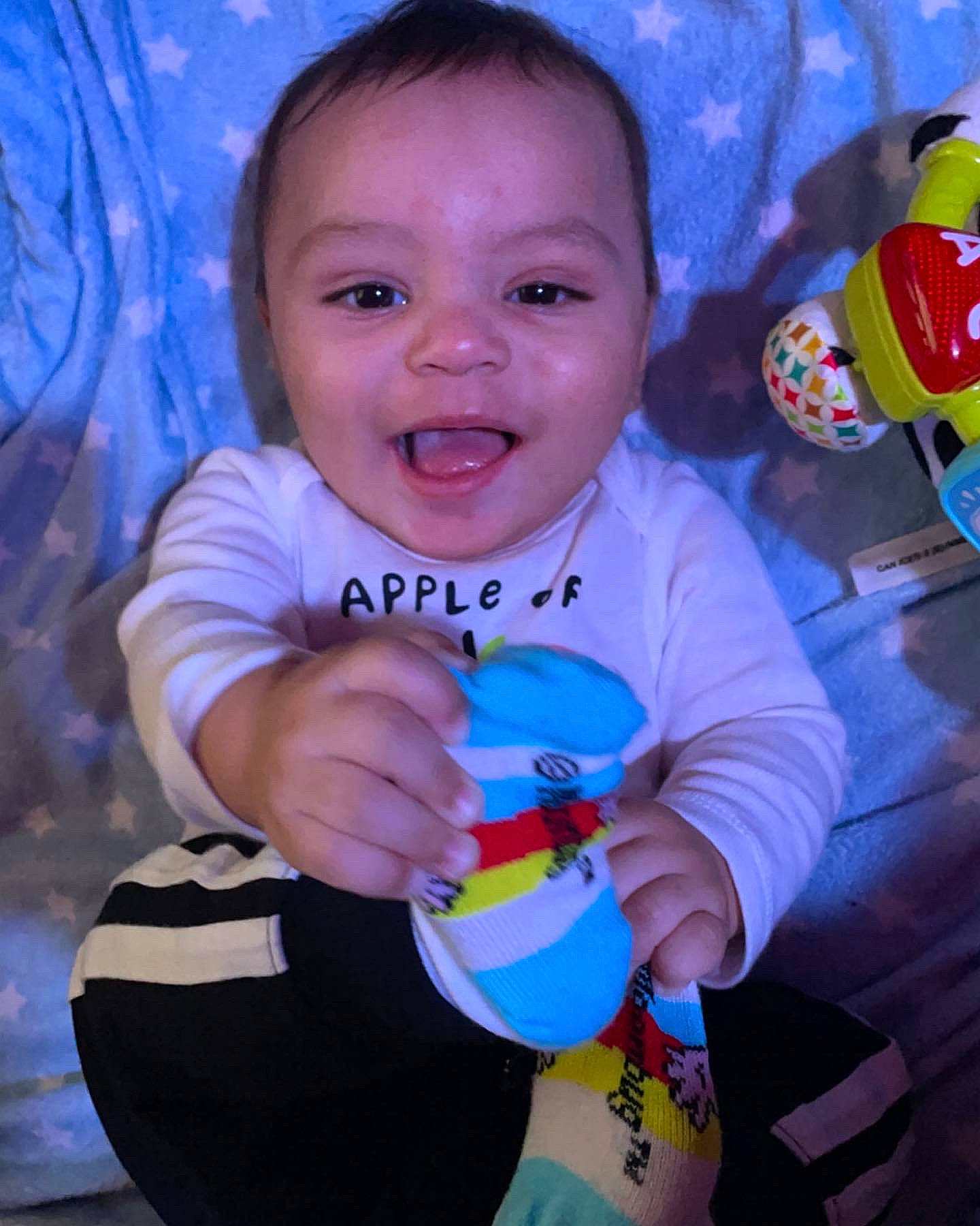 Eduardo is registered to the contest to win money with this photo: baby, baby_toddler_clothing, blue, cheek, child, electric_blue, facial_expression, fun, happy, iris, people, person, pink, product, skin, sleeve, smile, t_shirt, textile, toddler