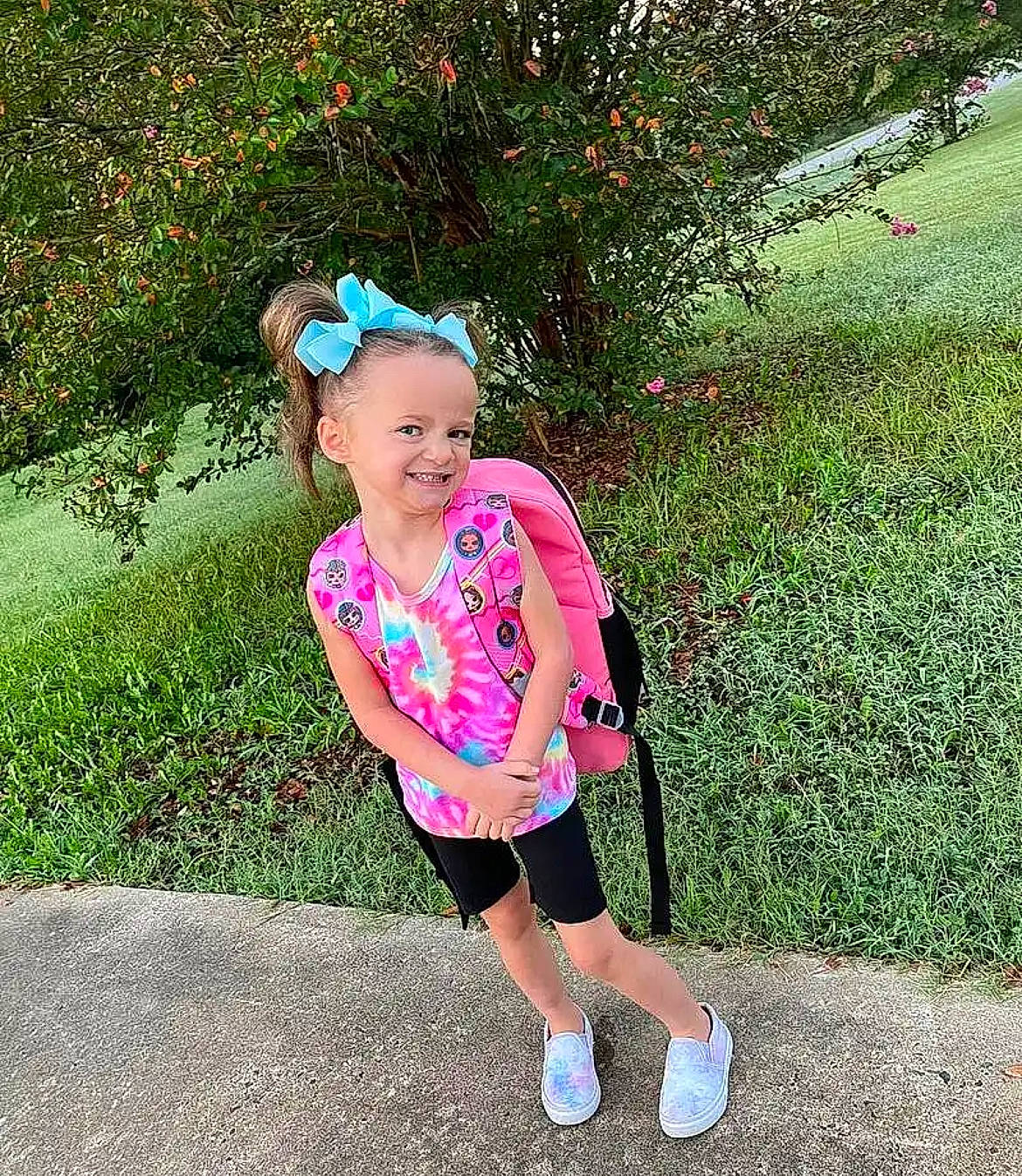 Kenzlee is registered to the contest to win money with this photo: child, electric_blue, eye, eyewear, fashion_accessory, flower, fun, grass, happy, hat, joy, leisure, magenta, people_in_nature, person, pink, plant, shorts, shrub, sleeve