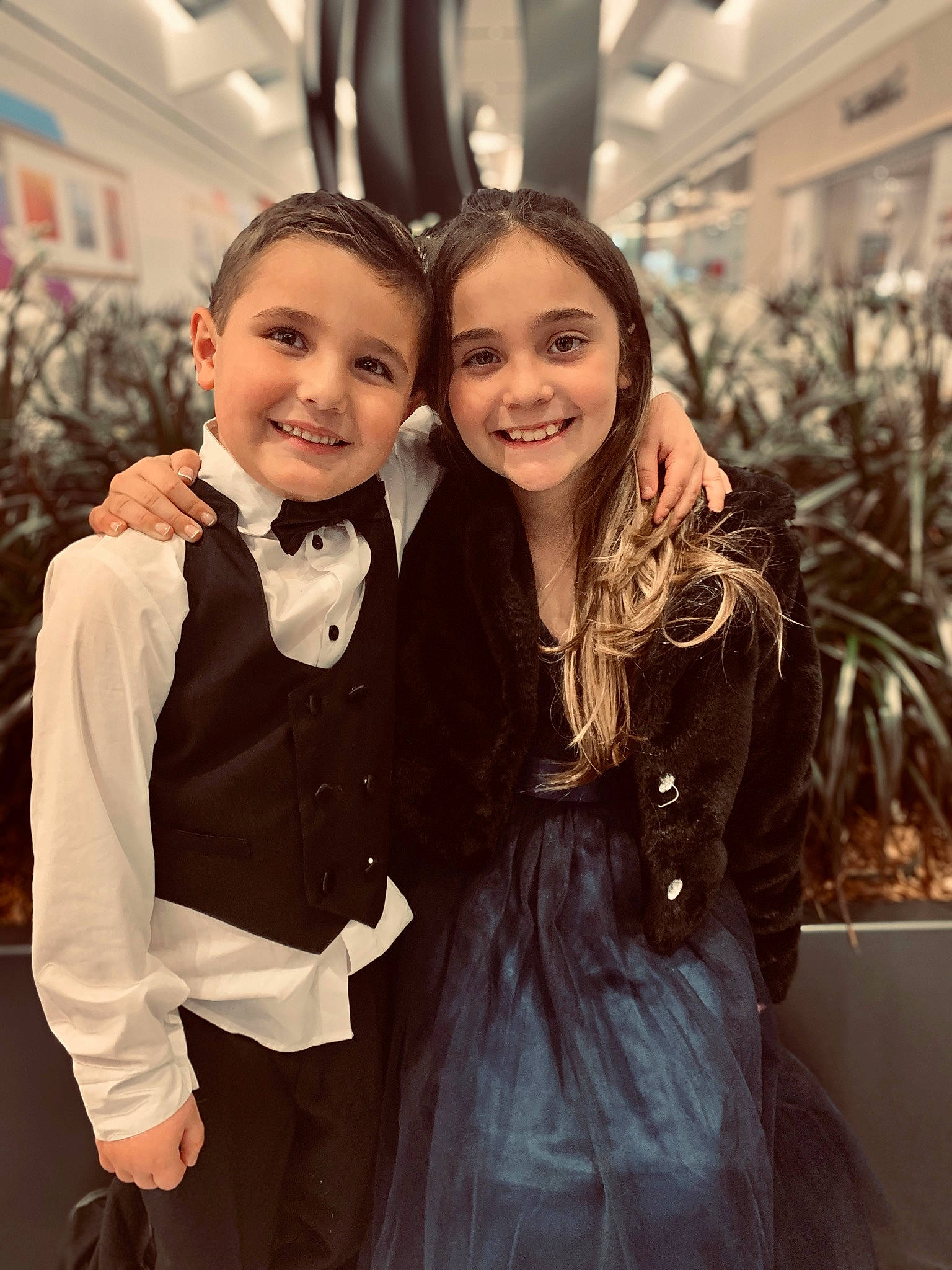 Kira is registered to the contest to win money with this photo: bow_tie, cool, dress, face, facial_expression, fashion, fashion_design, flash_photography, gesture, hairstyle, happy, human, iris, joy, person, skin, sleeve, smile, standing, street_fashion