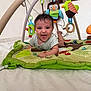 baby, play_mat, toy, plush_toy, bird_toy, owl_toy, tummy_time, smiling, indoor, floor, colorful, child, person, happy, crawling, clothing, home, cute, infant, playtime