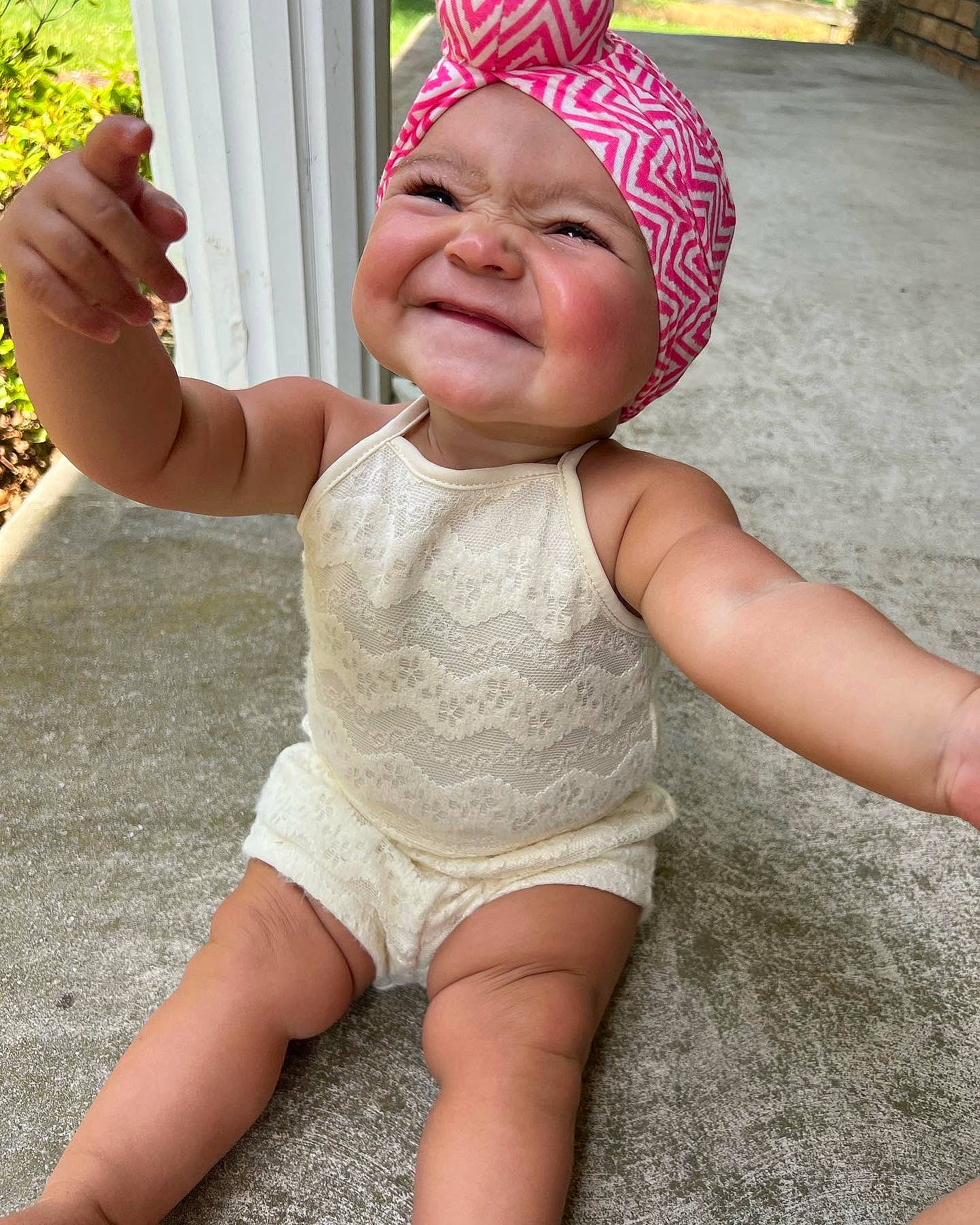 Elena joined the competition — help win amazing prizes! baby_toddler_clothing, cap, cool, face, finger, gesture, grass, happy, hat, head, headgear, headwear, human_body, joy, leisure, person, photograph, pink, skin, smile