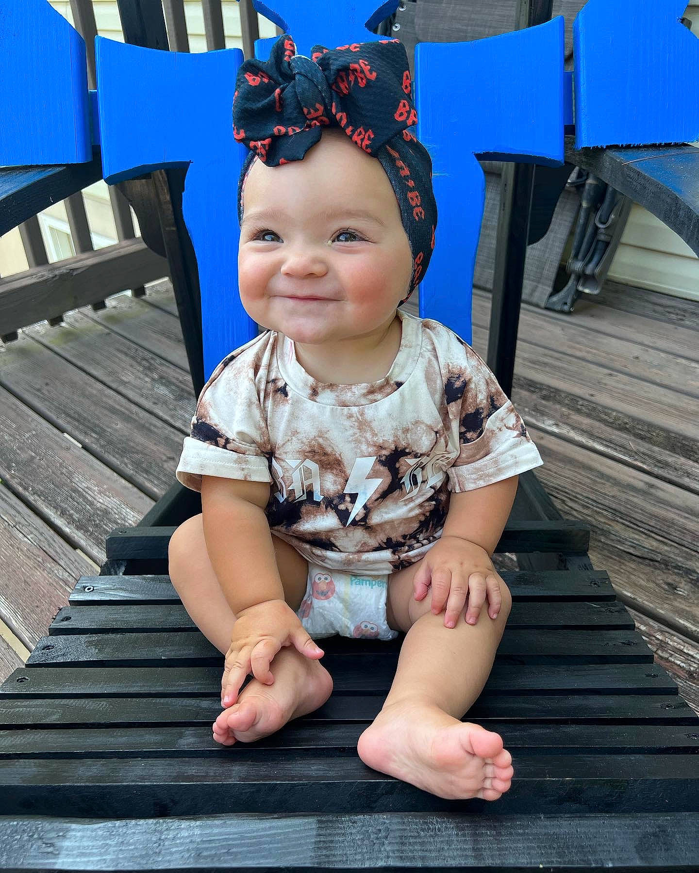 Elena is registered to the contest to win money with this photo: baby, baby_toddler_clothing, blue, child, eye, face, fashion_accessory, flash_photography, foot, fun, grass, happy, headgear, headwear, joy, leisure, pattern, person, skin, sleeve