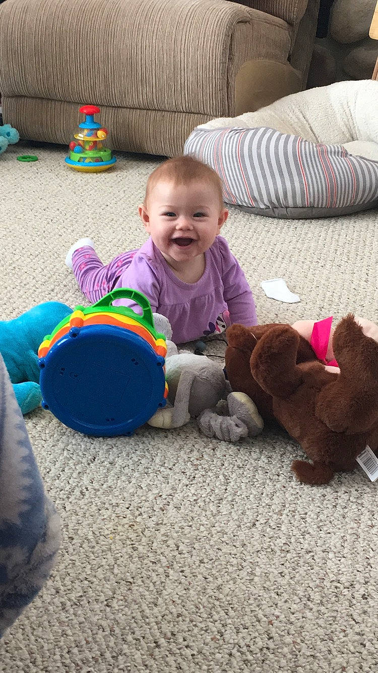 Aubreigh joined the competition — help win amazing prizes! baby, canidae, child, dog_breed, floor, flooring, person, play, sitting, sporting_group, toddler, toy