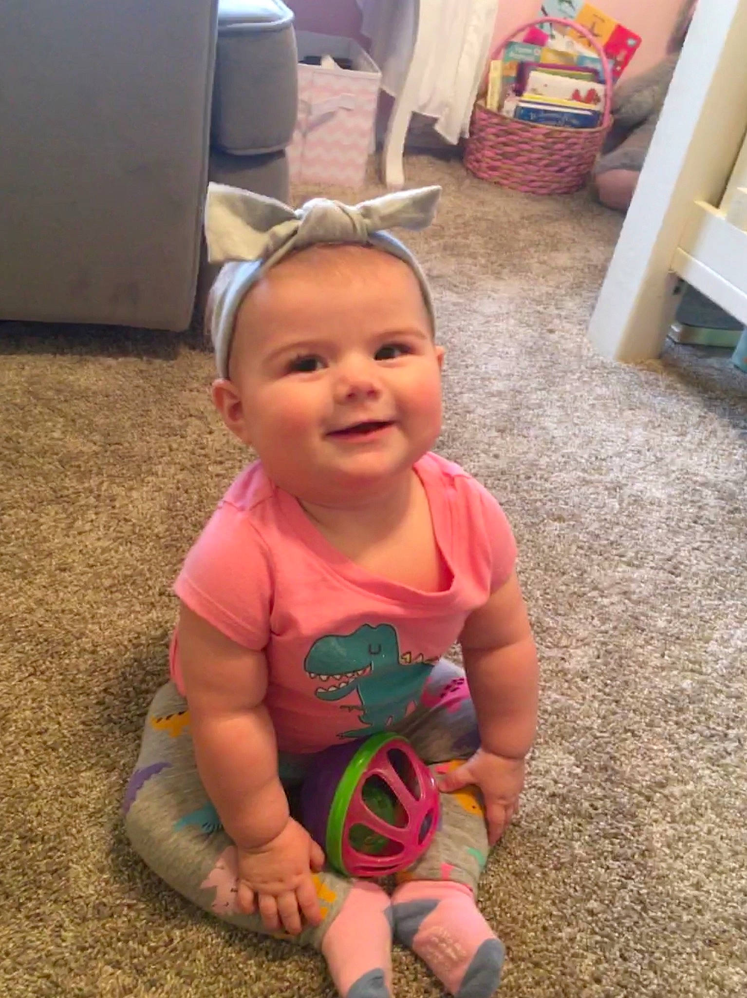 Ellyanna joined the competition — help win amazing prizes! baby, cheek, child, ear, electronic_device, face, facial_expression, fun, head, joy, person, pink, play, skin, smile, toddler, vacation