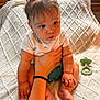 Mazy joined the competition — help win amazing prizes! baby, child, infant, person, hand, tattoo, hair_tie, ponytails, pacifier, blanket, texture, sitting, cute, indoor, skin, clothing, expression, support, foot, arm