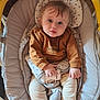Naoh a rejoint le concours — aidez-le/la à gagner de superbes lots ! baby, infant, child, rocker, baby_clothing, brown_sweater, cream_pants, indoor, seat, baby_buckle, curious, blue_eyes, hands, feet, cushion, child_seat, portrait, looking_at_camera, toddler, cozy