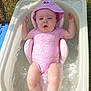 Ashley a rejoint le concours — aidez-le/la à gagner de superbes lots ! baby, bathtub, water, pink_onesie, pink_hat, outdoor, grass, towel, summer, child, infant, sunny, relaxing, splashing, plastic_tub, cute, skin, legs, arms, headwear