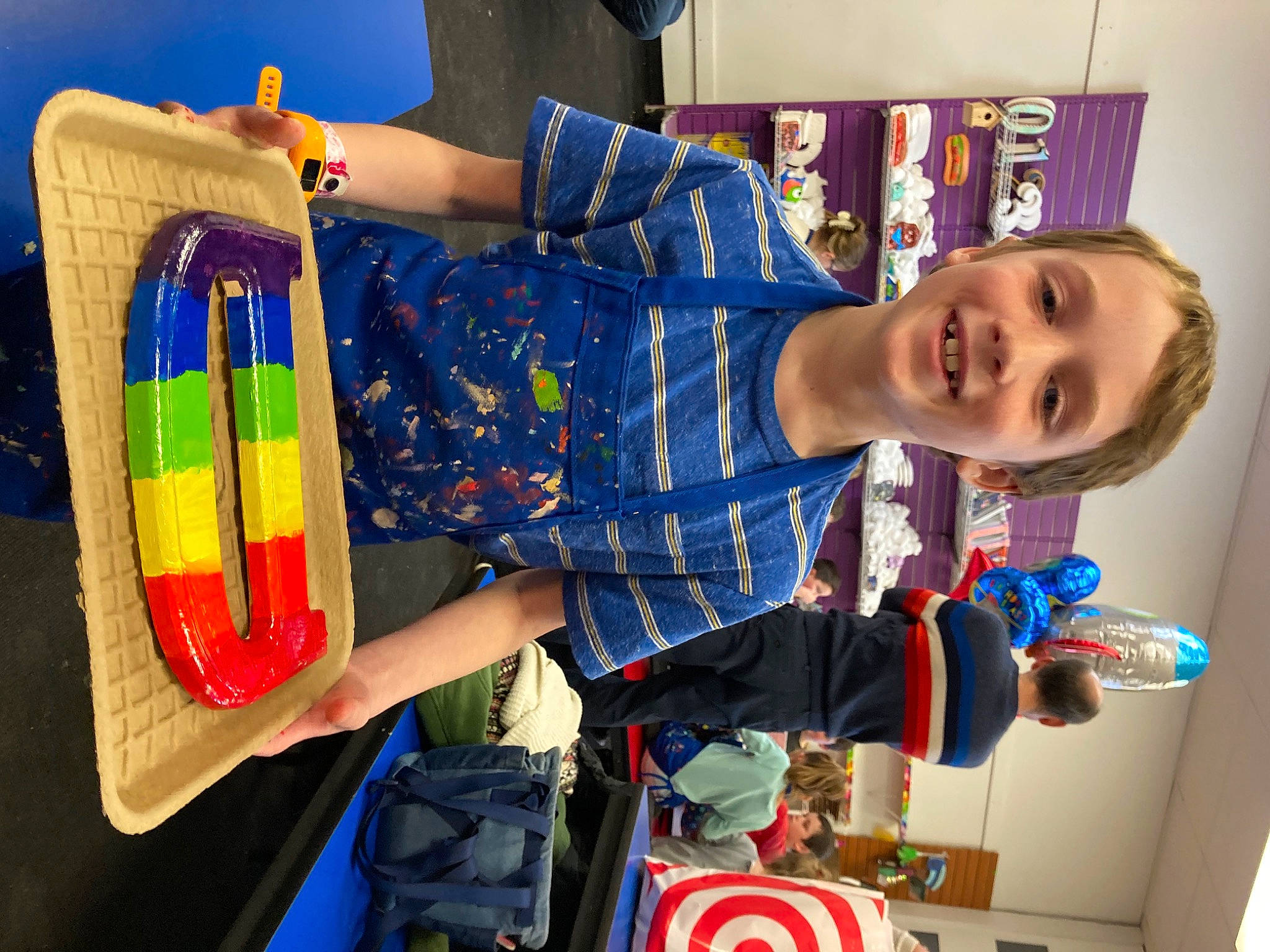 Dominic is registered to the contest to win money with this photo: art, artist, blurred, child, electric_blue, engineering, fashion_design, fun, happy, joy, leisure, paint, pattern, person, plaid, plastic, play, room, smile, snapshot