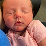 Luna joined the competition — help win amazing prizes! baby, newborn, sleeping, infant, pink_shirt, text_on_clothing, closeup, face, peaceful, soft_light, human, child, portrait, cuddling, skin, head, cute, happy, clothing, resting