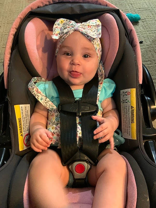 Kensington joined the competition — help win amazing prizes! baby, baby_carriage, baby_products, baby_safety, baby_toddler_clothing, car_seat, chair, child, comfort, fashion_accessory, fun, happy, headwear, human_leg, lap, person, sitting, smile, thigh, toddler