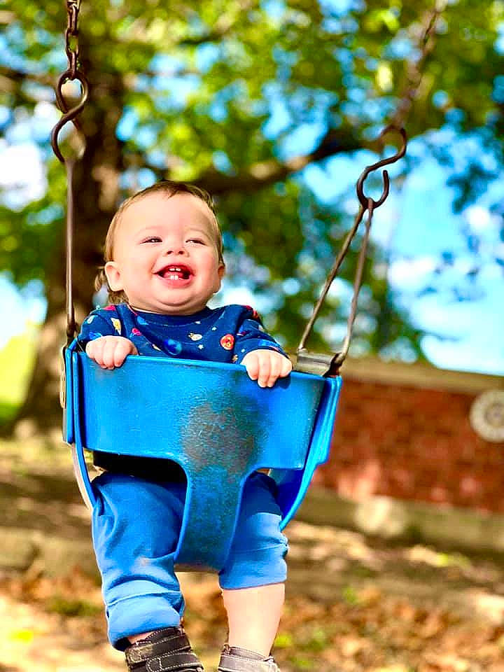 Kayden joined the competition — help win amazing prizes! baby, baby_toddler_clothing, branch, child, electric_blue, eye, face, grass, happy, head, joy, leaf, leisure, outdoor_play_equipment, people_in_nature, person, playground, recreation, smile, swing