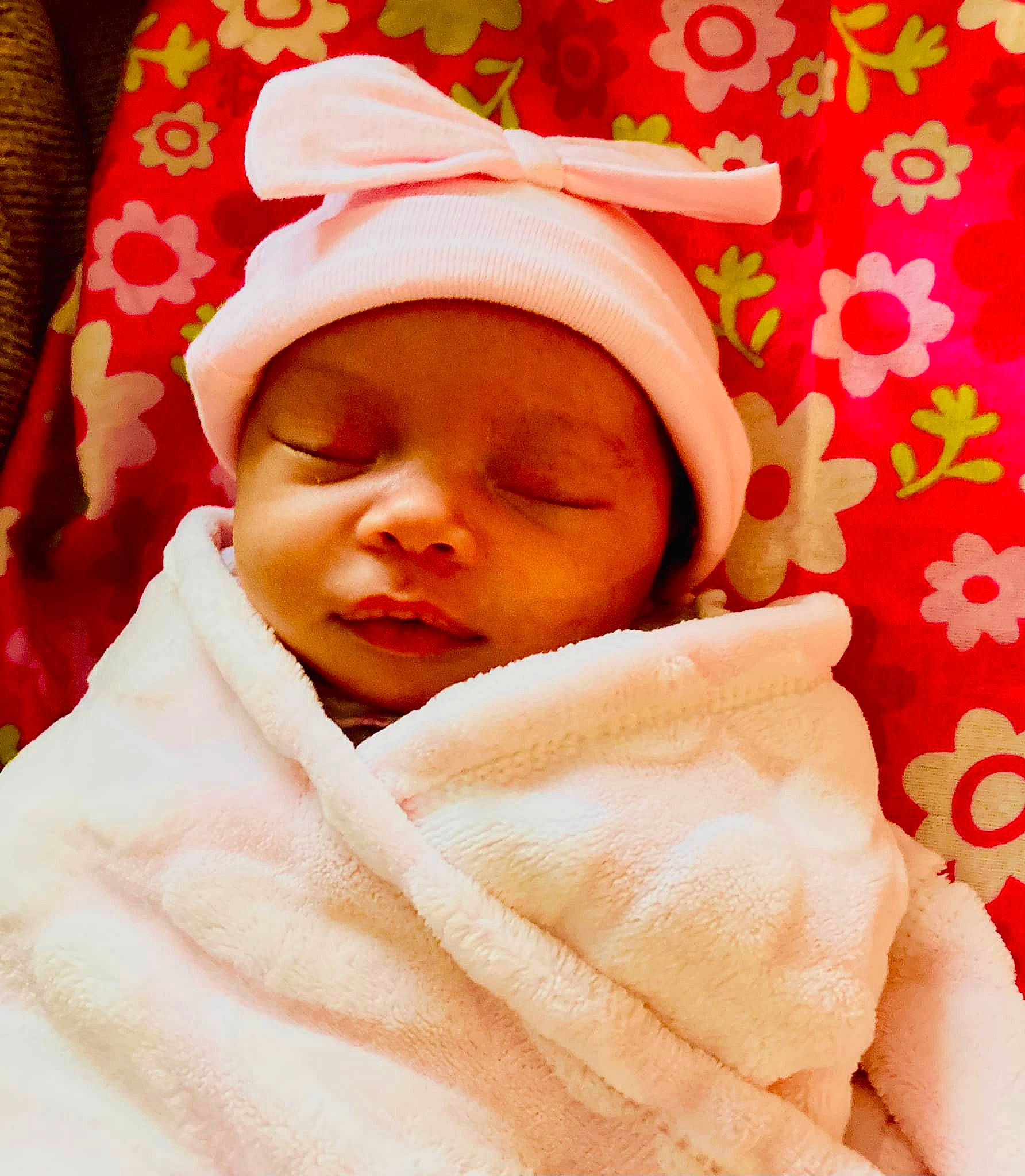 Indigo joined the competition — help win amazing prizes! baby, baby_products, baby_sleeping, baby_toddler_clothing, bedding, bedtime, cheek, child, comfort, happy, hat, headwear, linens, orange, peach, person, pink, skin, sleeve, textile