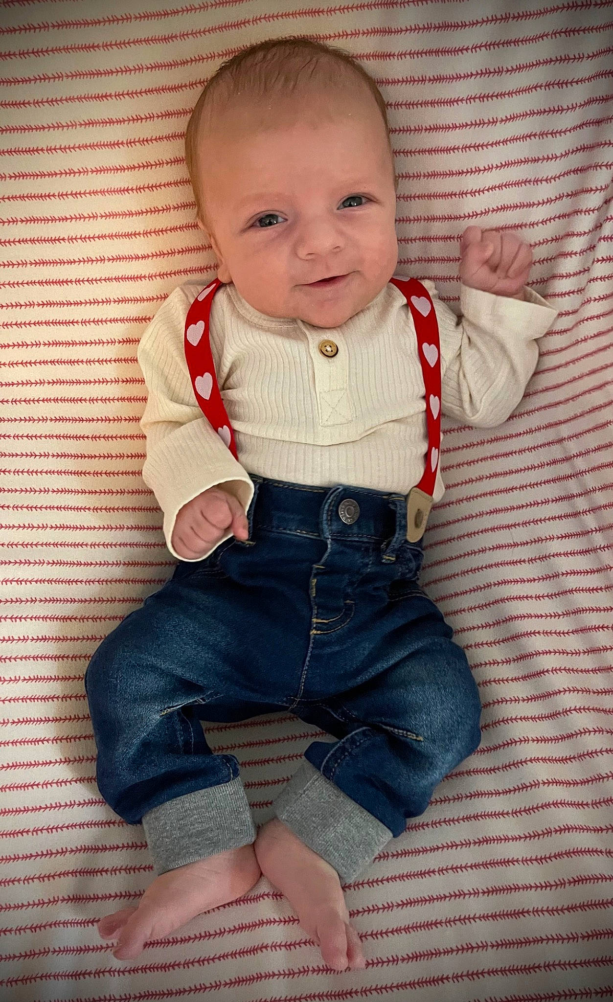 Briar is registered to the contest to win money with this photo: baby, baby_toddler_clothing, cheek, child, collar, denim, dress_shirt, eye, happy, iris, leg, pattern, person, sitting, skin, sleeve, smile, t_shirt, textile, toddler