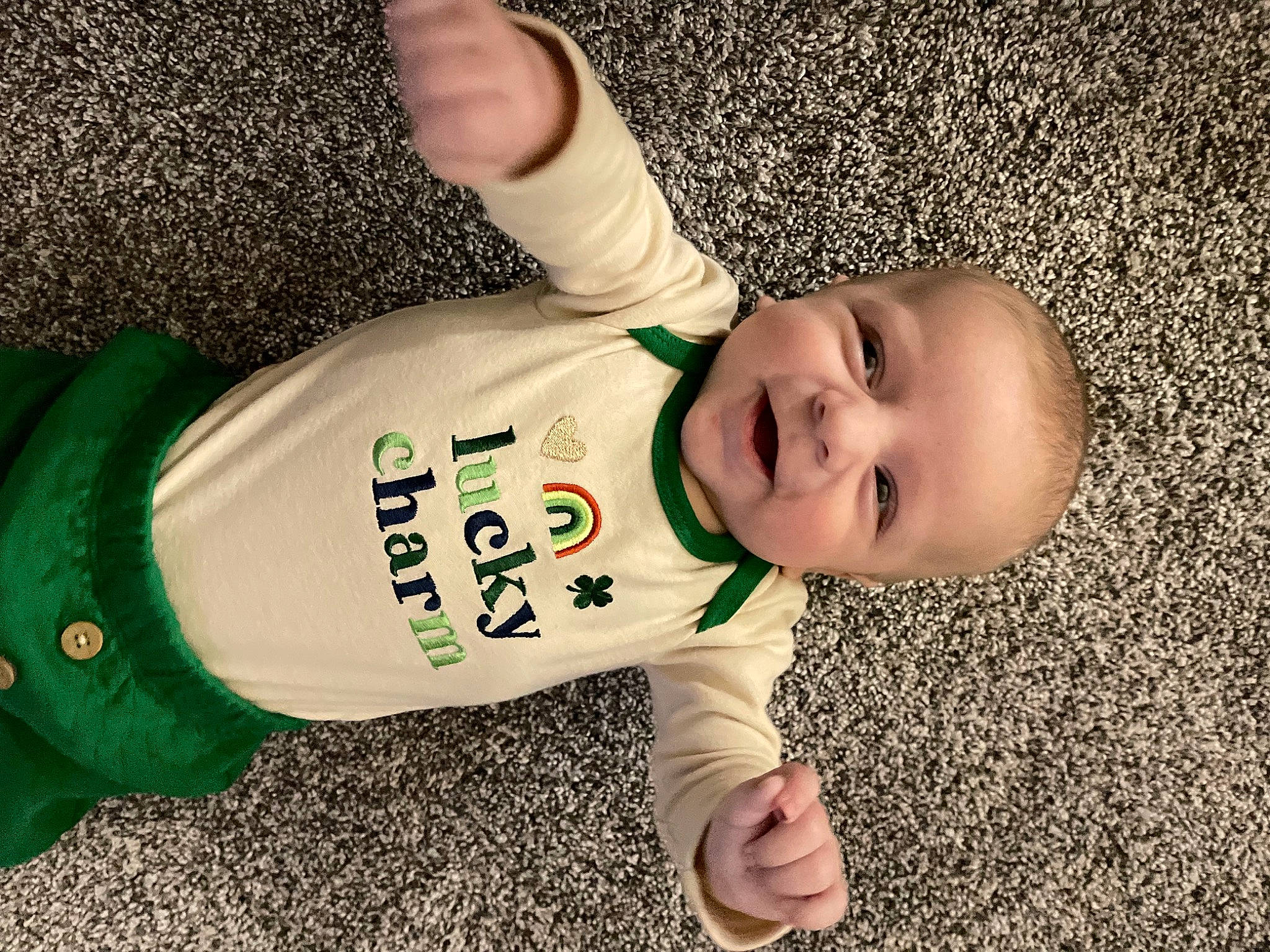 Briar is registered to the contest to win money with this photo: baby, baby_laughing, baby_toddler_clothing, cheek, child, finger, flooring, foot, fun, grass, happy, head, human_body, person, sleeve, smile, t_shirt, thumb, toddler, tree