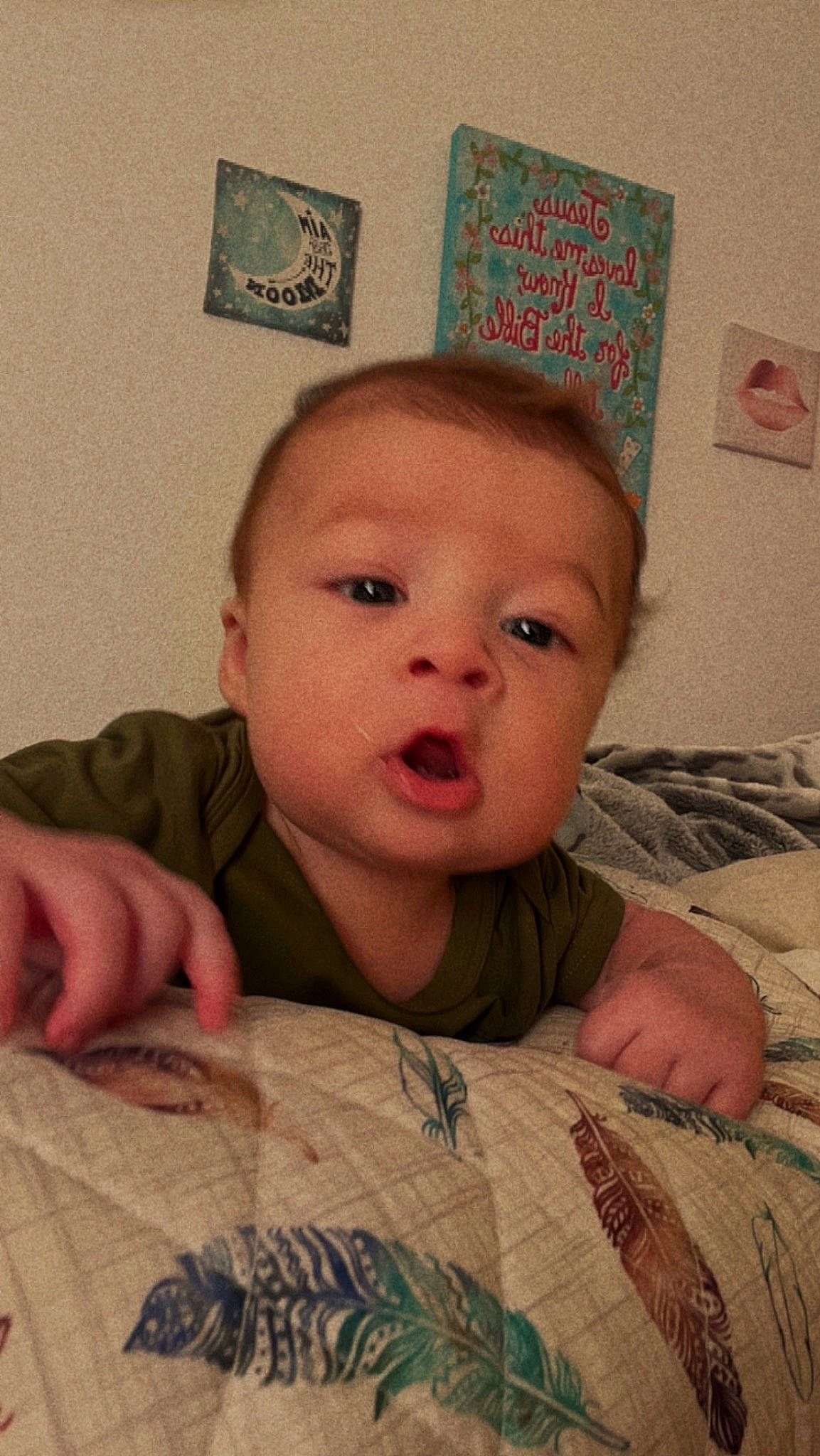 Legend is registered to the contest to win money with this photo: baby, baby_toddler_clothing, cheek, child, chin, comfort, eye, eyebrow, finger, flooring, forehead, iris, linens, mouth, nose, person, skin, sleeve, textile, toddler