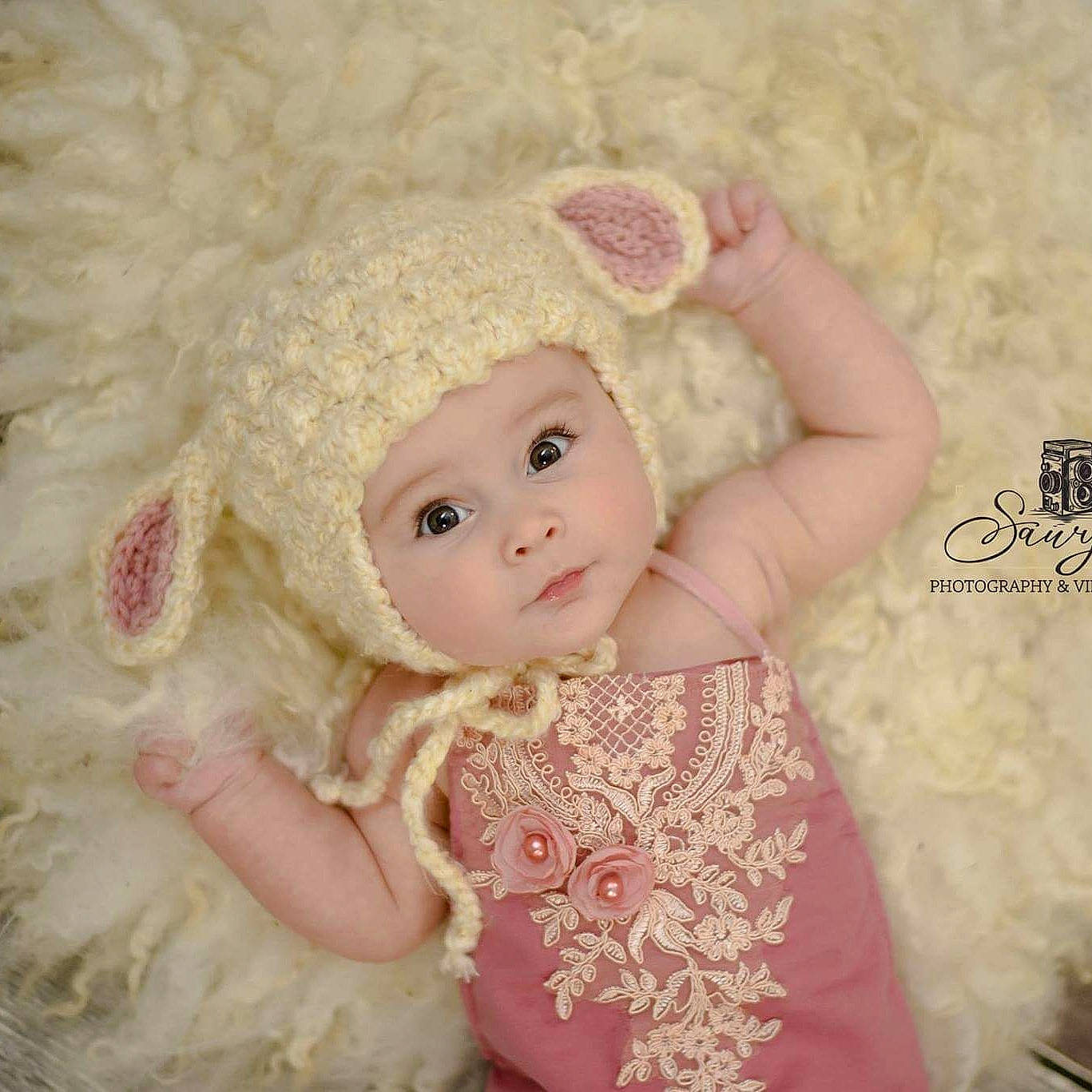 Olivia Grace is registered to the contest to win money with this photo: baby, beige, child, crochet, doll, dress, fawn, fur, hat, headgear, knitting, person, pink, skin, stuffed_toy, toy, white, wool