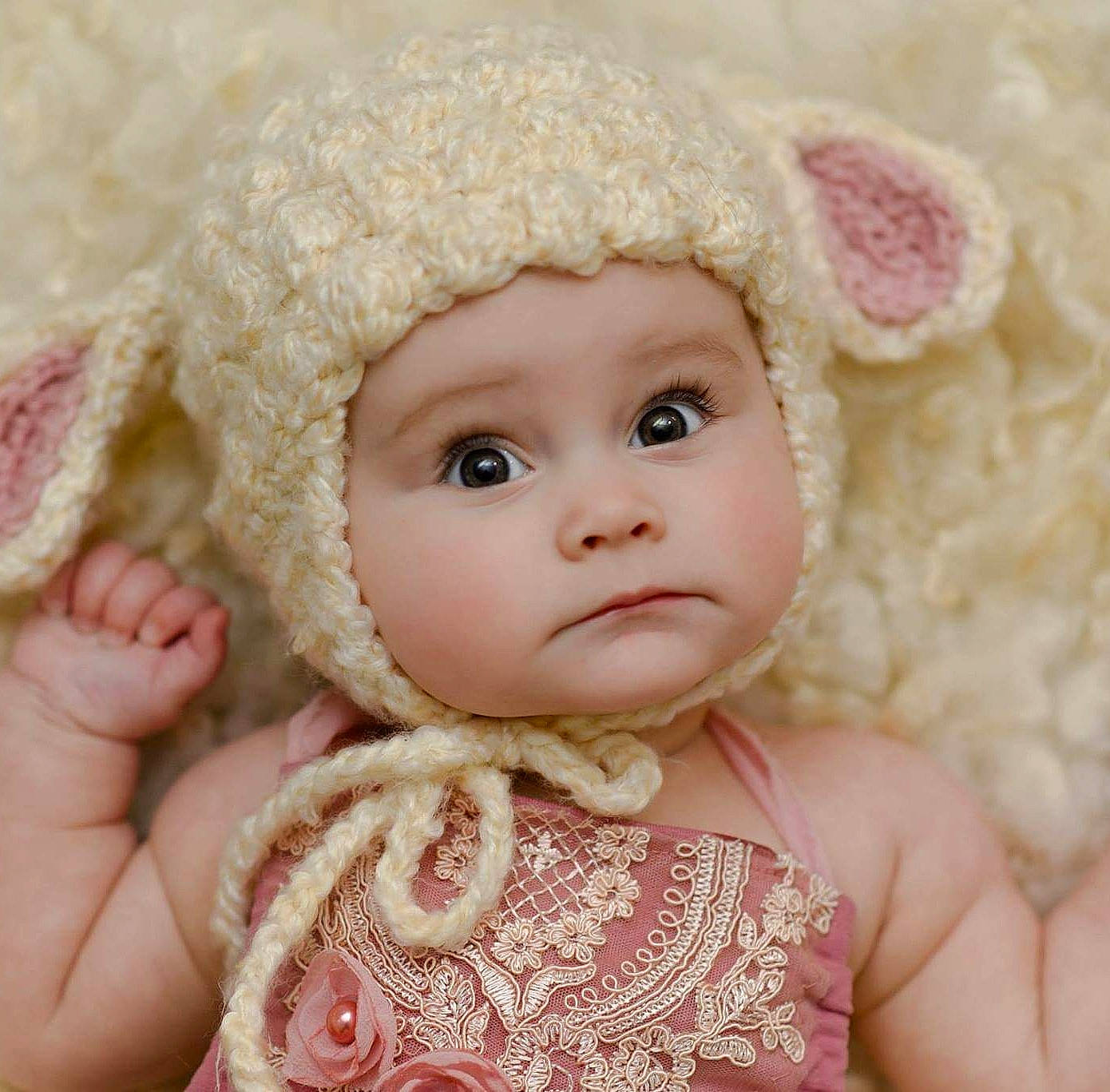 Olivia Grace is registered to the contest to win money with this photo: baby, beige, cap, cheek, child, crochet, doll, fur, hand, hat, headgear, person, pink, skin, stuffed_toy, toddler, toy, wool