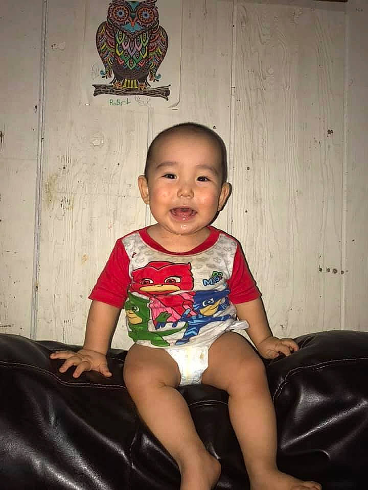 Hank is registered to the contest to win money with this photo: child, furniture, leg, person, sitting, toddler