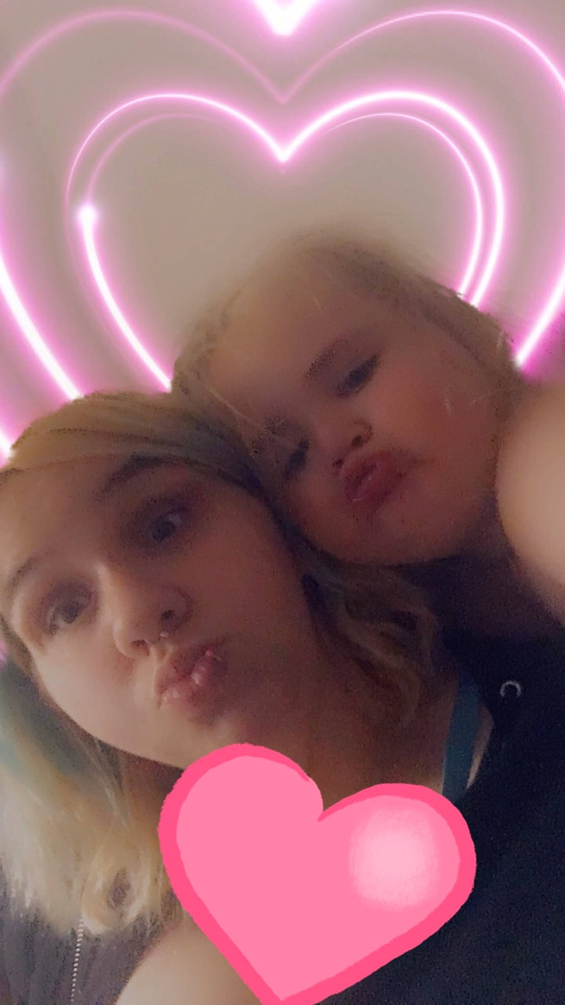 Bayley is registered to the contest to win money with this photo: cheek, ear, eyelash, facial_expression, fun, gesture, happy, human, light, lighting, lip, mouth, nose, organ, person, pink, purple, red, skin, violet