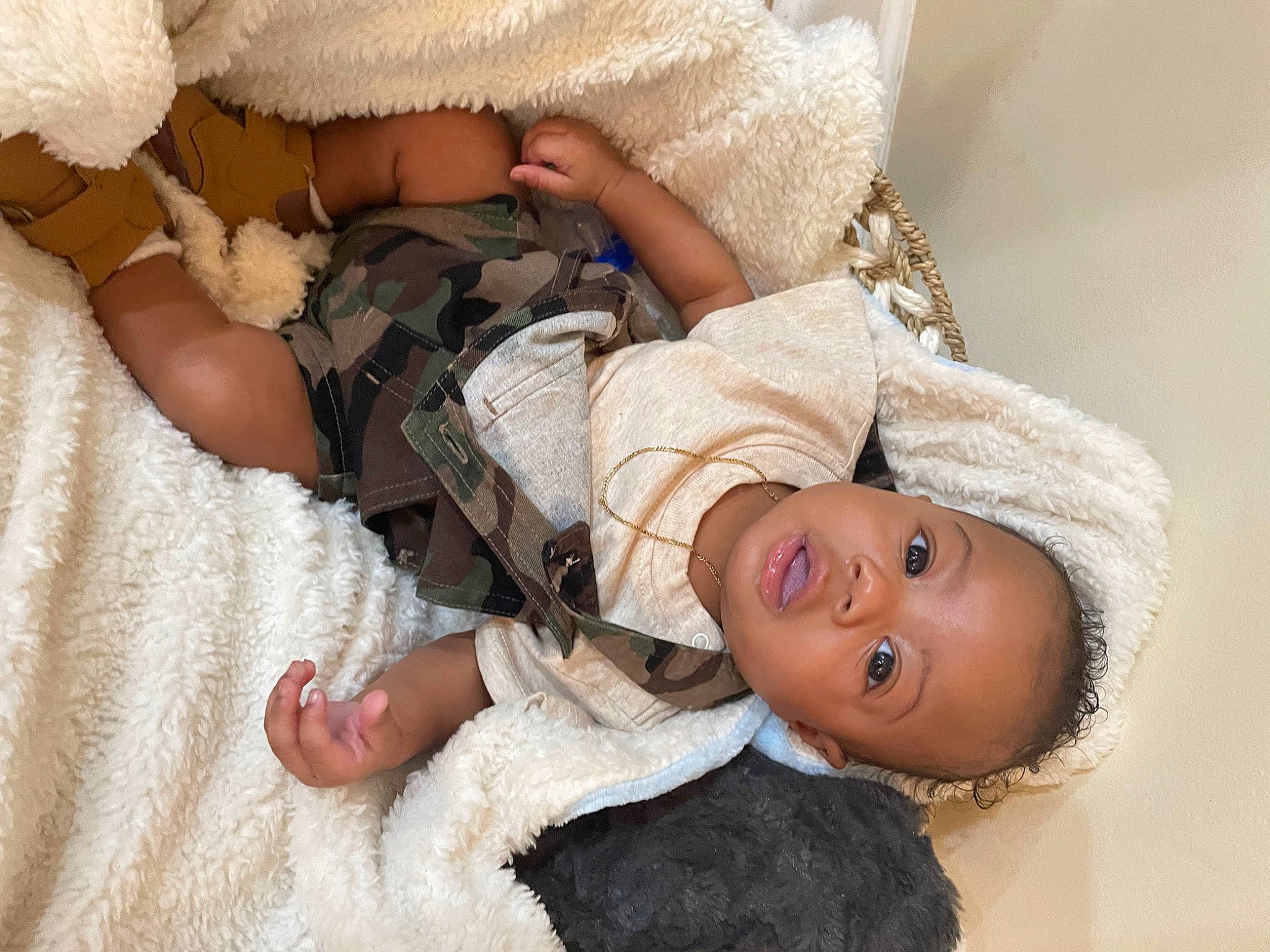 Brenton is registered to the contest to win money with this photo: baby, baby_sleeping, baby_toddler_clothing, child, comfort, dress, eye, face, finger, gesture, happy, hat, headgear, human_body, leg, linens, person, skin, sleeve, sun_hat